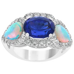 5 Carat Oval Tanzanite, Diamond and Opal Ring 14 Karat White Gold, Estate