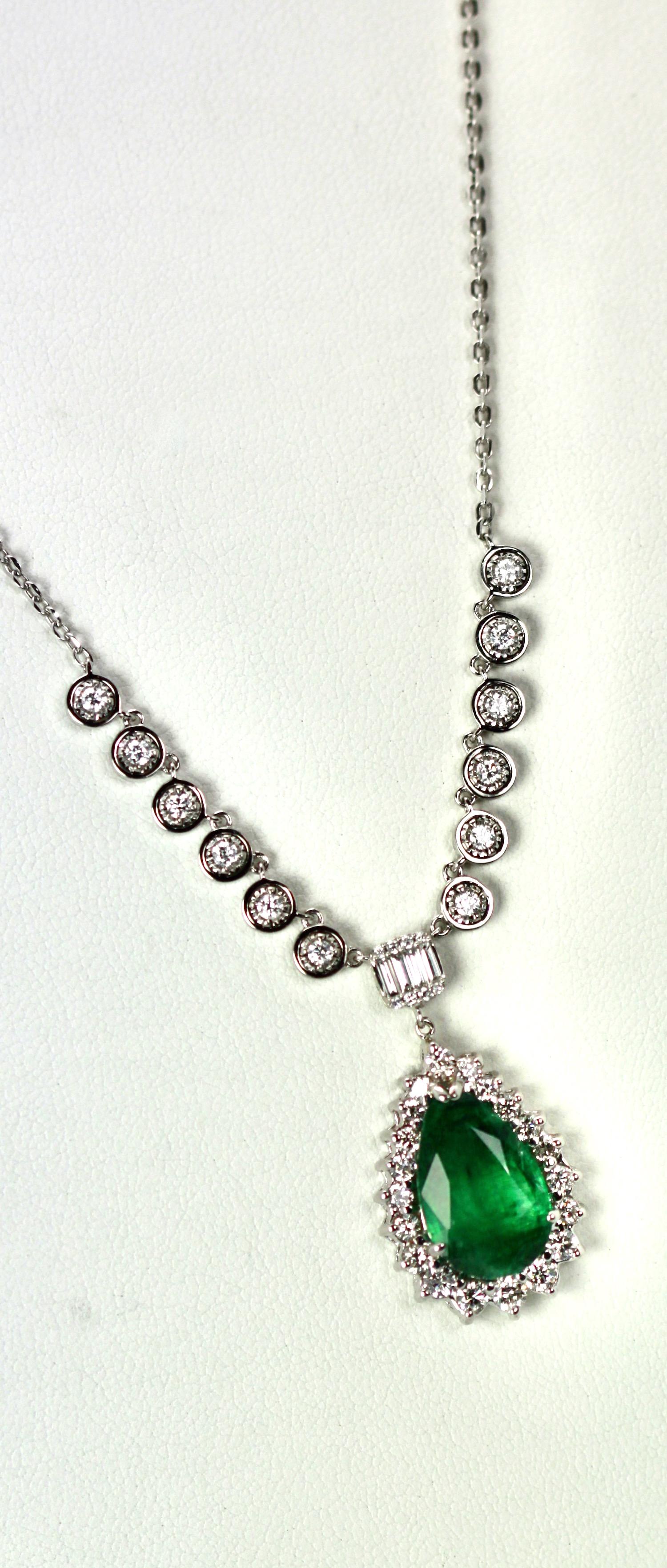 5 Carat Pear Emerald with Diamond Surround 18K For Sale 6