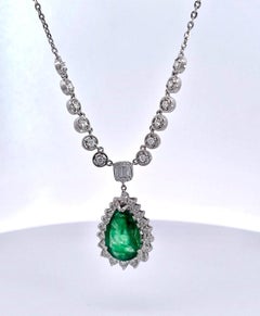 5 Carat Pear Emerald with Diamond Surround 18K