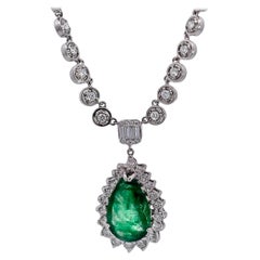 5 Carat Pear Emerald with Diamond Surround 18K