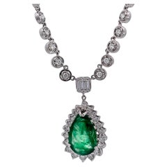 5 Carat Pear Emerald with Diamond Surround 18K
