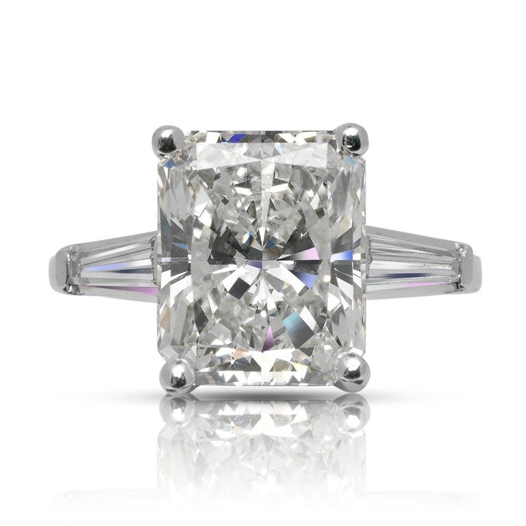 LOLA - RADIANT CUT THREE STONE DIAMOND ENGAGEMENT RING BY MIKE NEKTA
GIA CERTIFIED

Center Diamond
Carat Weight: 5 Carats
Color :  I
Clarity: VS2
Style:   CUT-CORNERED RECTANGULAR MODIFIED BRILLIANT
Approximate Measurements: 11 x 9. x 6 mm
 