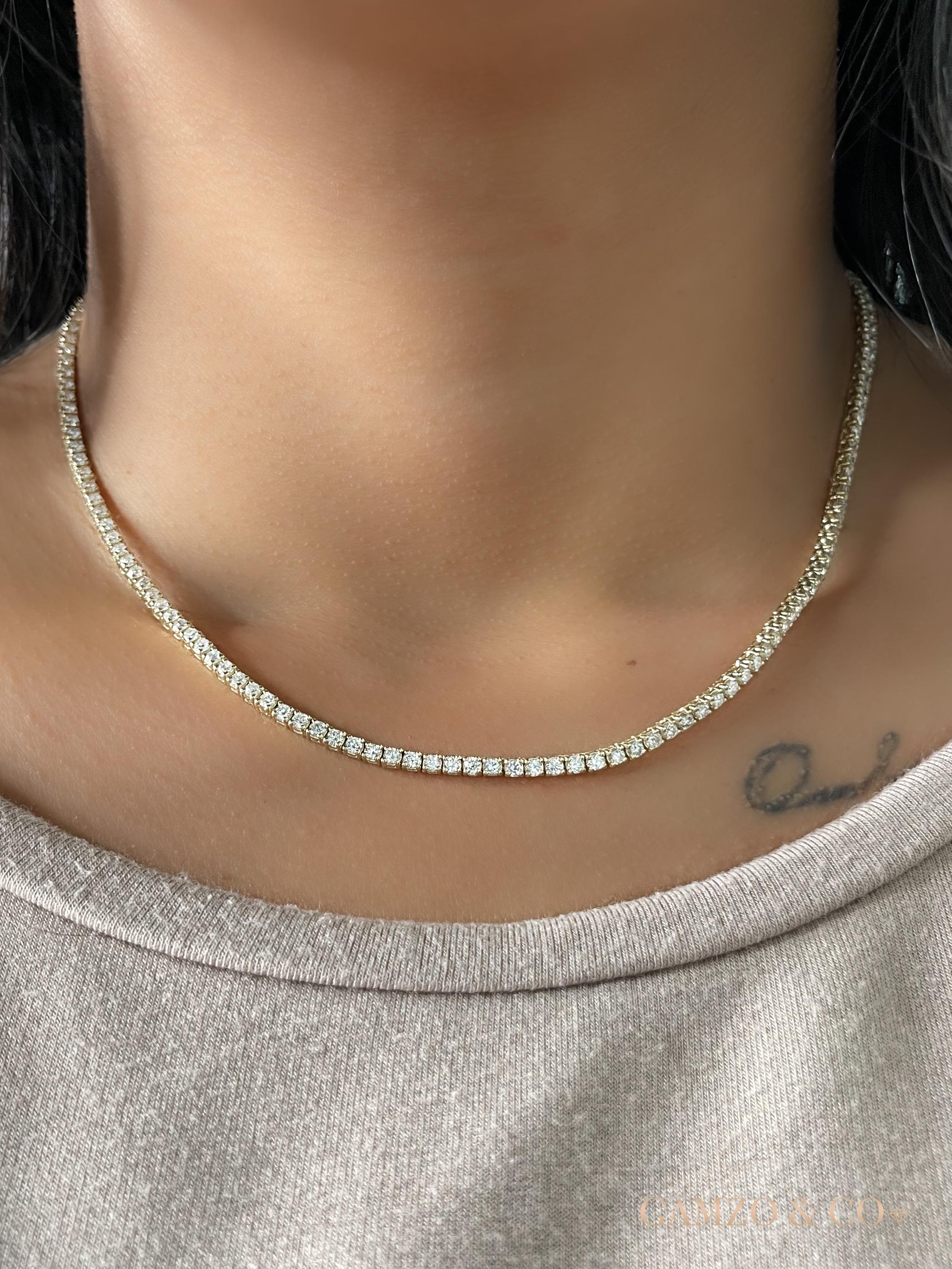 5 Carats of round diamond set on a shared prong setting in 14k white gold to create a timeless necklace. 

Metal: 14k Gold
Diamond Cut: Round
Total Approx. Diamond Carats: 5ct
Diamond Clarity: VS
Diamond Color: F-G
Size: 16
Color: White