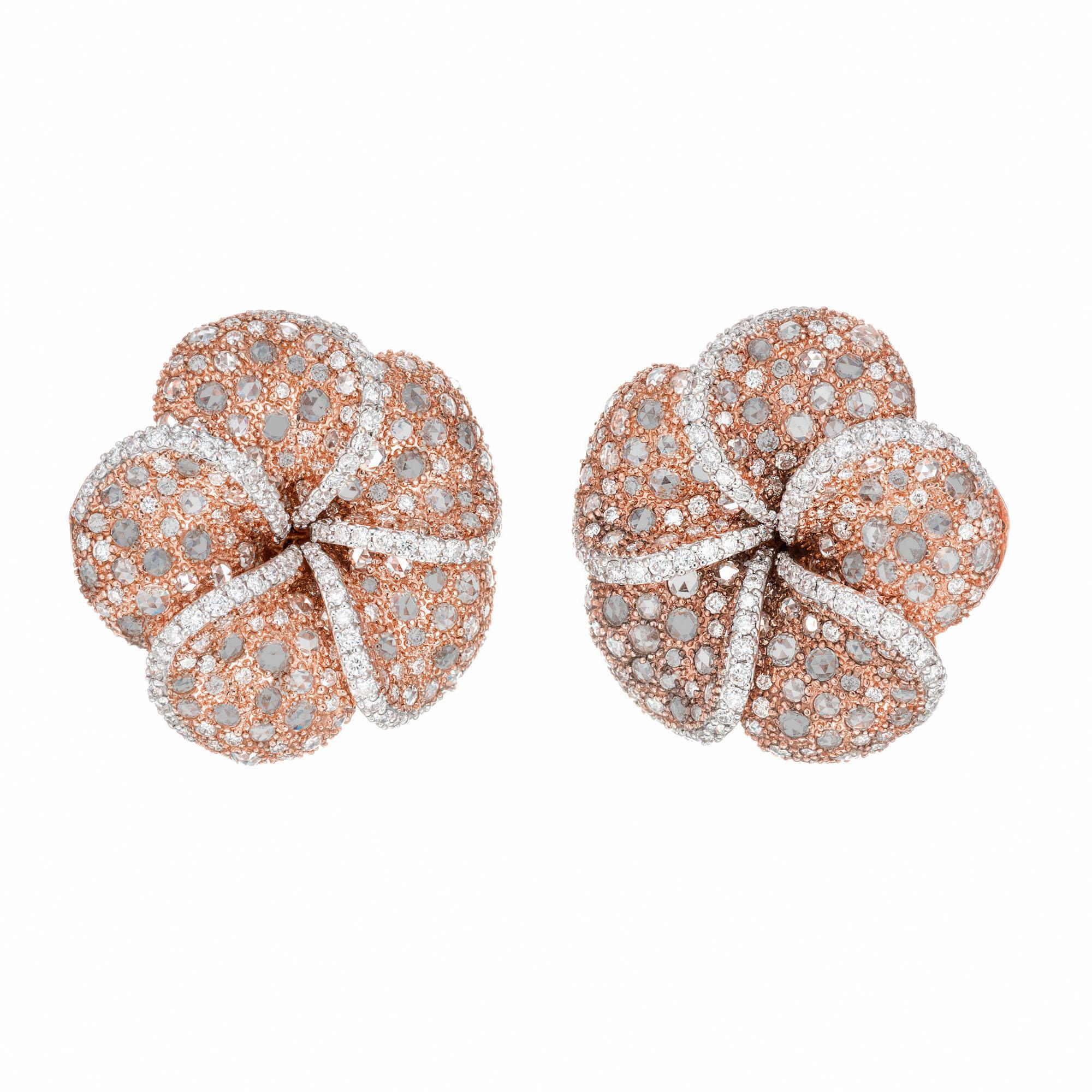 Artistically crafted Diamond cluster clip post earrings. 150 round brilliant cut diamonds with 350 round and rose cut natural coffee colored diamonds set in 18k rose gold flower settings with 18k yellow back frames. These earrings are very hard to