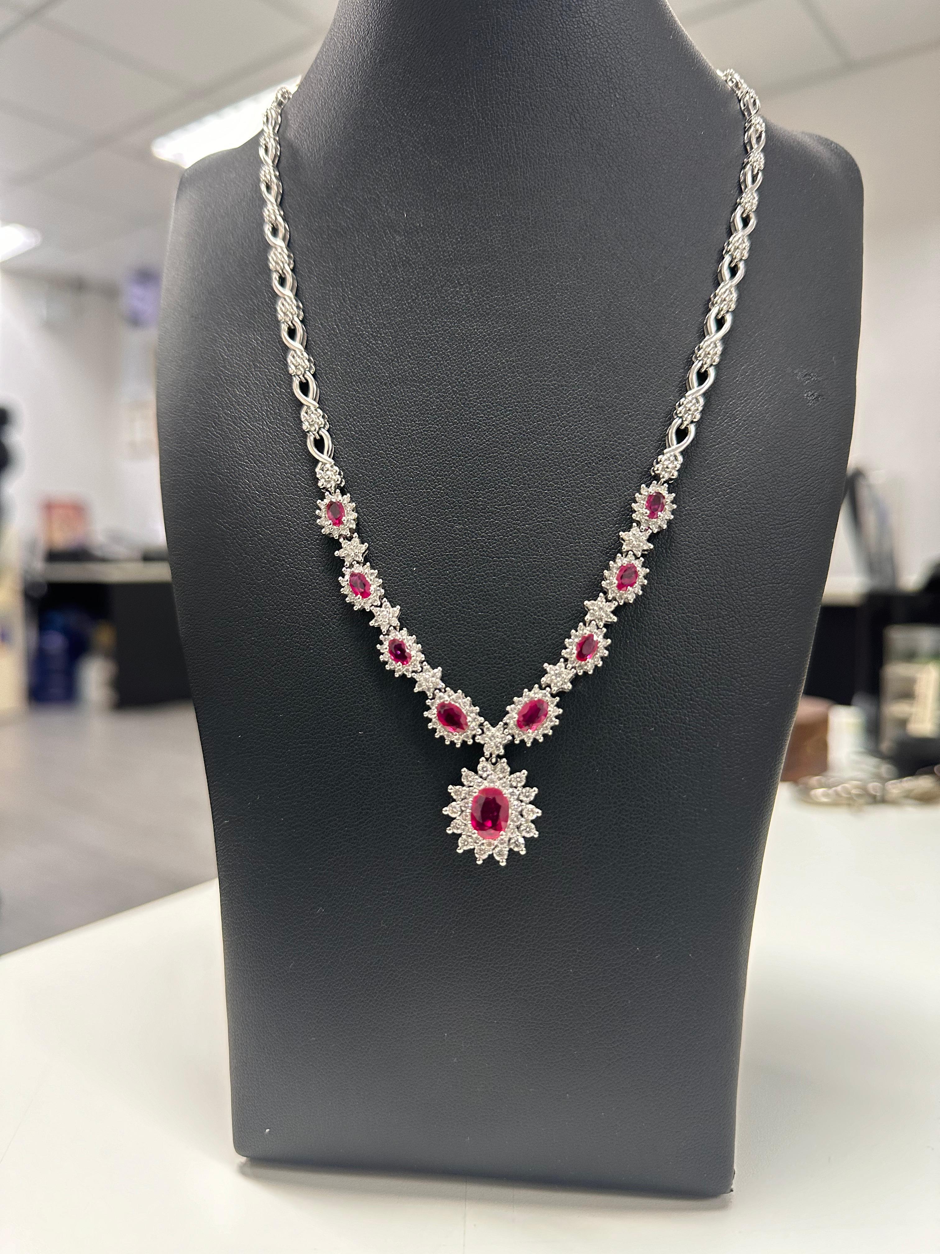 A graceful fusion of heritage and elegance, this extraordinary necklace showcases the allure of Burmese rubies and the brilliance of natural diamonds in a timeless floral design. Crafted in 28 grams of 14K white gold, the piece is both luxurious in