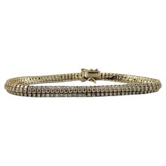 Bracelet en or jaune 14 carats à trois rangs de diamants de 5 carats