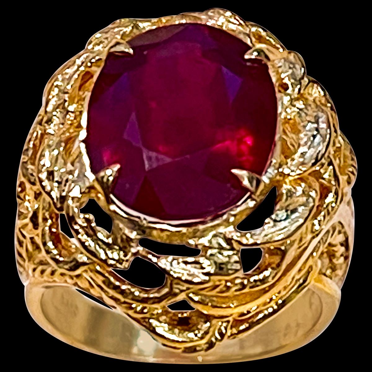 5 Carat Treated  Oval Ruby 14 Karat Yellow Gold Cocktail Ring Size 6
 prong set
14 K Yellow Gold: 9.6  gram
Stamped 14K
Ring Size 6 ( can be altered for no charge )
Large approximately 5  carat oval shape ruby Treated 
Very solid make of the ring
