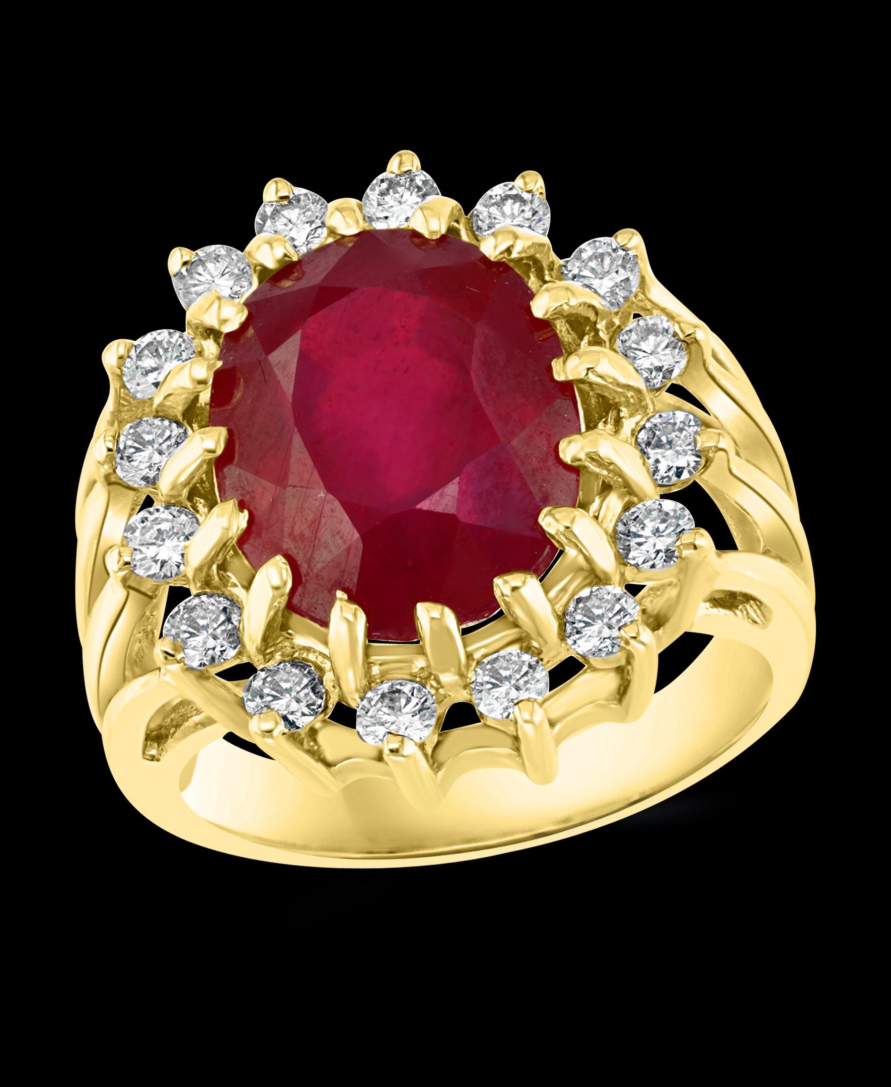 5 Carat Treated Ruby And Diamond 14 Karat Yellow Gold Ring Size 6
 prong set
14 K Yellow Gold: 8  gram
Stamped 14K
Ring Size 6 ( can be altered for no charge )
Large 5 carat oval shape ruby Treated surrounded by brilliant cut diamonds .
Diamonds: 