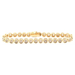 5 Carat TW Diamond Bezel Set Tennis Bracelet in 18k Yellow Gold 7"