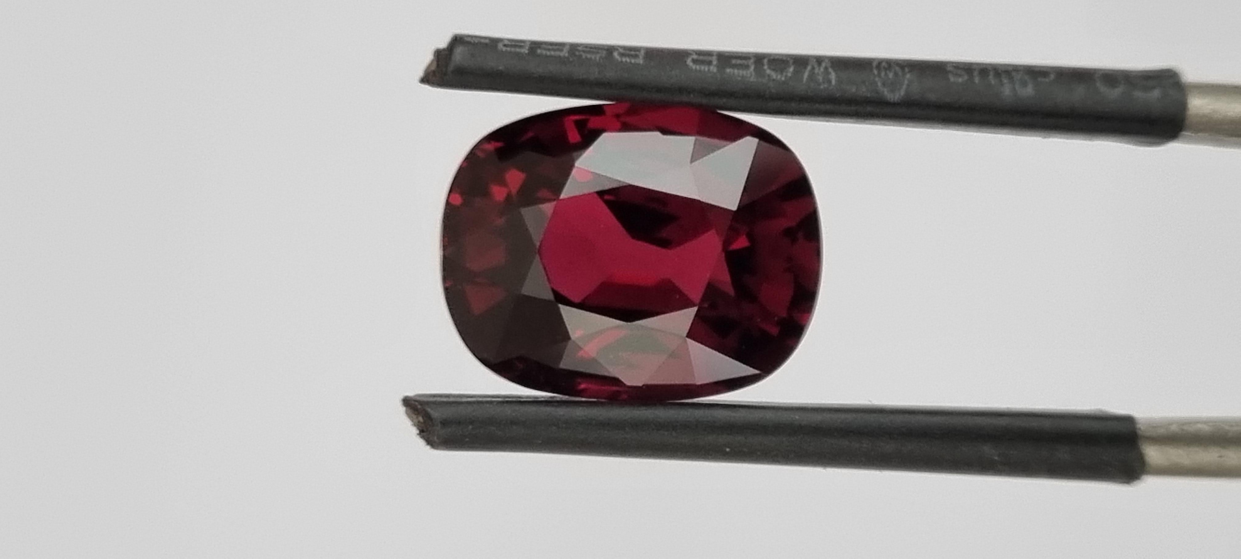 A stunning 5 carat unheated pigeon blood ruby. 

This gorgeous ruby from Mozambique is full of charm and luster. 

Cut in a traditional modern rectangular cushion style, and exhibiting a pure, deep red hue, this gem would be perfect for a Diamond