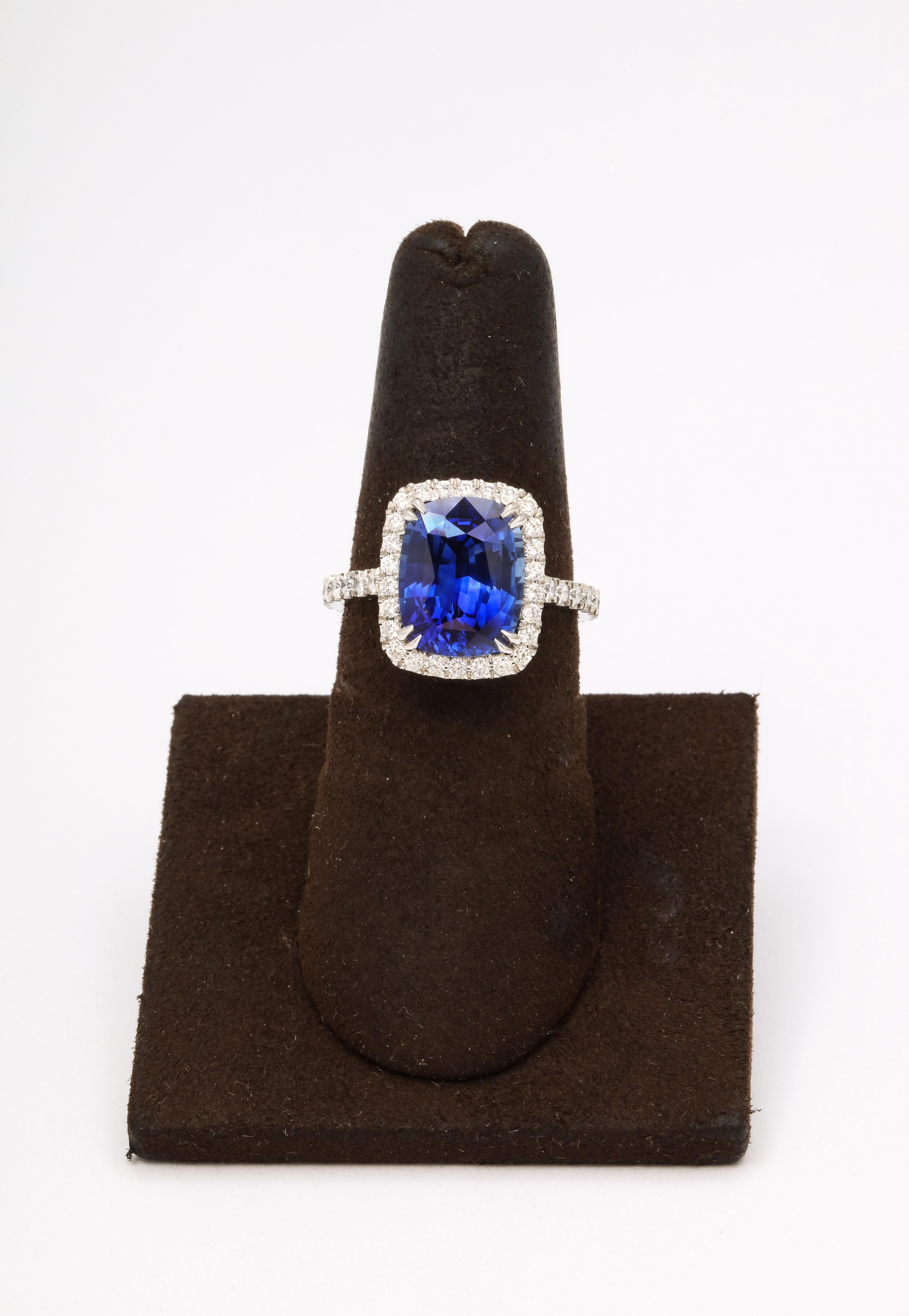
A STUNNING Ceylon Sapphire!! 

The most sought after shape!

Certified 5.50 carat Elongated Cushion Cut VIVID BLUE sapphire set in a custom made platinum mounting with .85 carats of colorless white round brilliant cut diamonds. 

Currently a size