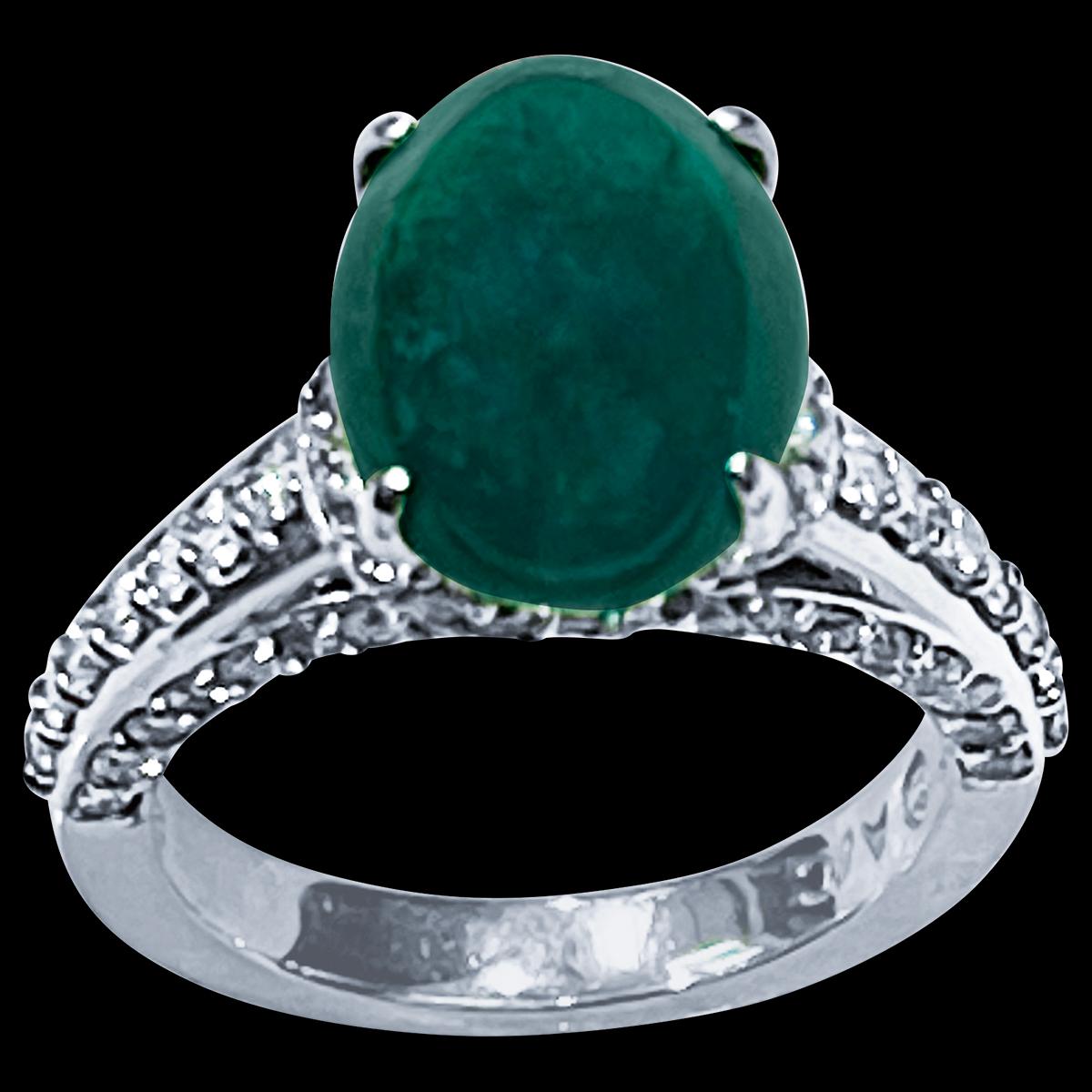 A classic, Cocktail ring 
5 Carat Zambian Emerald Cabochon & Diamond Cocktail  Ring 14 Karat White Gold with diamond  on the band  , Estate with no color enhancement. 
Gold: 14 Karat  White  gold ,
Weight: 7.2 gram with stone 
Diamond approximately