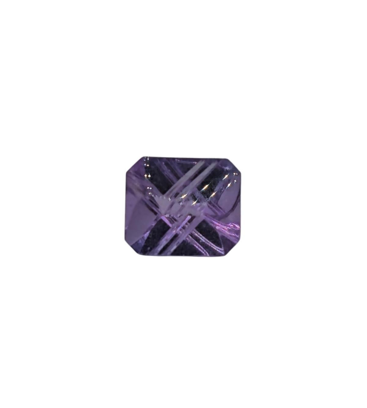 Elevate your jewelry collection with the mesmerizing 5 ct Amethyst Fantasy Cut gemstone. Radiant in its shape and size at 12x10 mm, this amethyst is a true masterpiece. Its fantasy cut amplifies the stone's inherent beauty, showcasing a unique