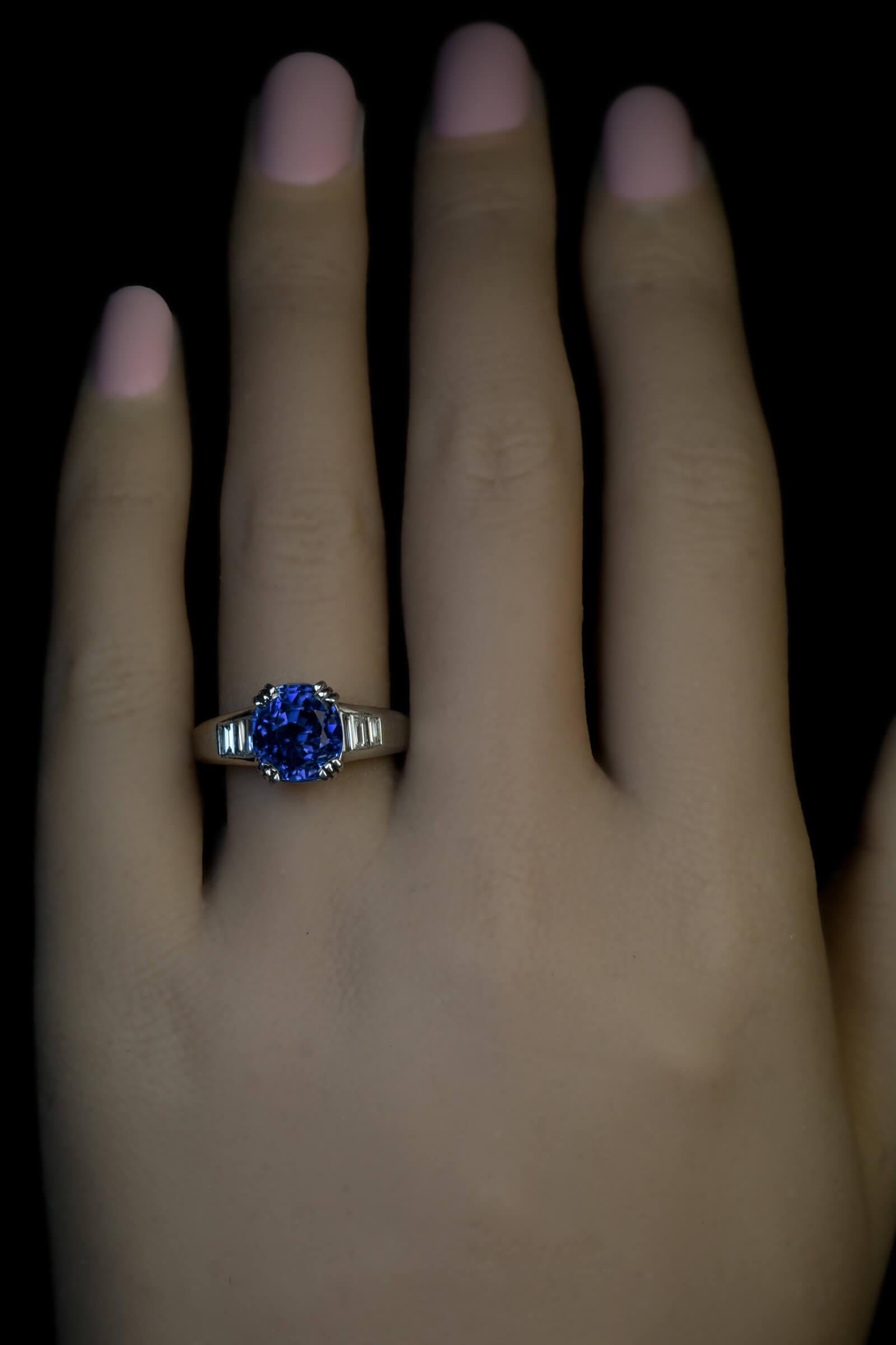 Originally, this 5.06 ct natural unheated Ceylon sapphire was set in an Art Deco era vintage ring. The sapphire is an old mine cut stone circa early 1900s. It was recently re-set into this modern custom made solid platinum ring. The sapphire is