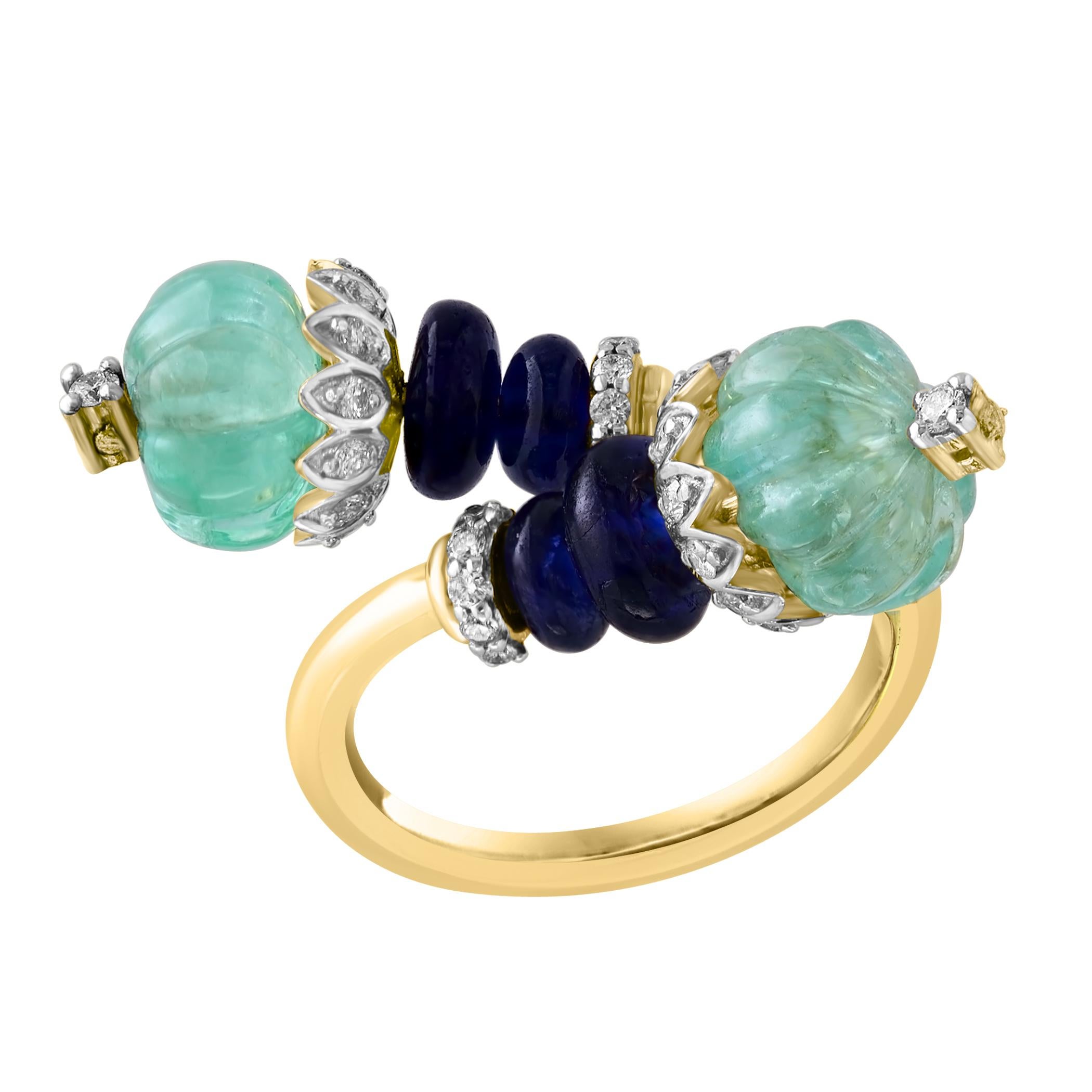 Presenting a timeless beauty, the 5 Ct Emerald Bead & 2.5 Ct Sapphire Beads & Diamond Ring in 18 Kt Yellow Gold, Size 5, is a classic piece that exudes elegance. This ring features two stunning Emerald Beads in melon shape  of exceptional quality ,