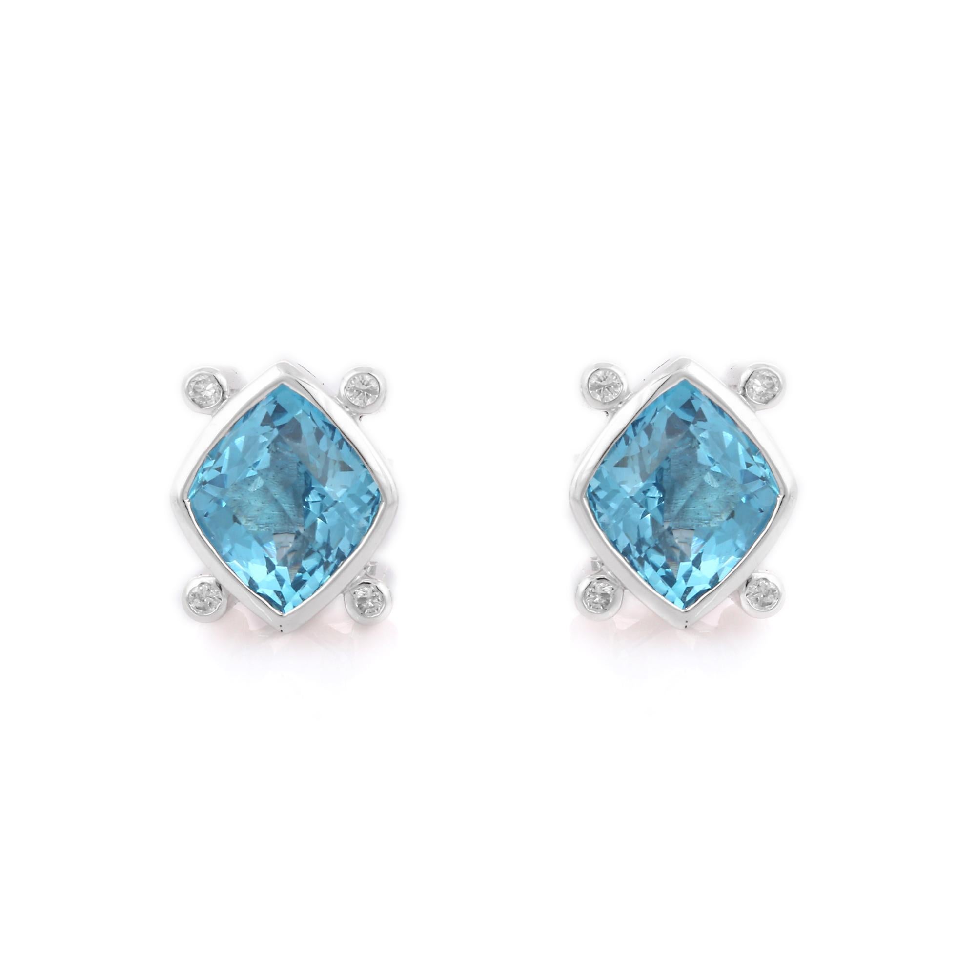 Modern 5 Cts Natural Blue Topaz and Diamond 18K White Gold Stud Earrings For Sale