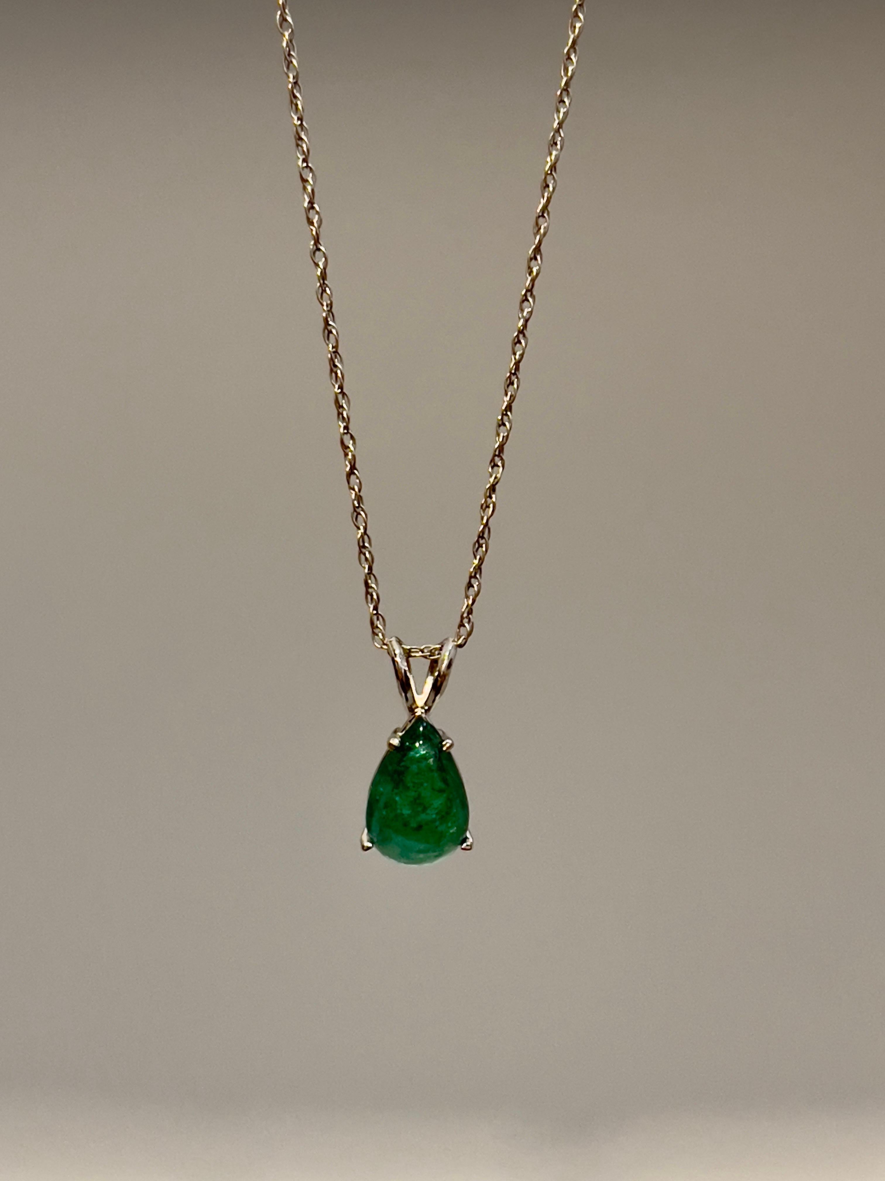 Approximately 5 Ct Natural Emerald Zambia Cabochon  Pendant 14 Karat White Gold Chain

 Emerald is about 5 carat 
Very desirable color and quality. Extreme fine color and clarity.
comes  in  a 14 Karat White gold chain
Emerald origin is