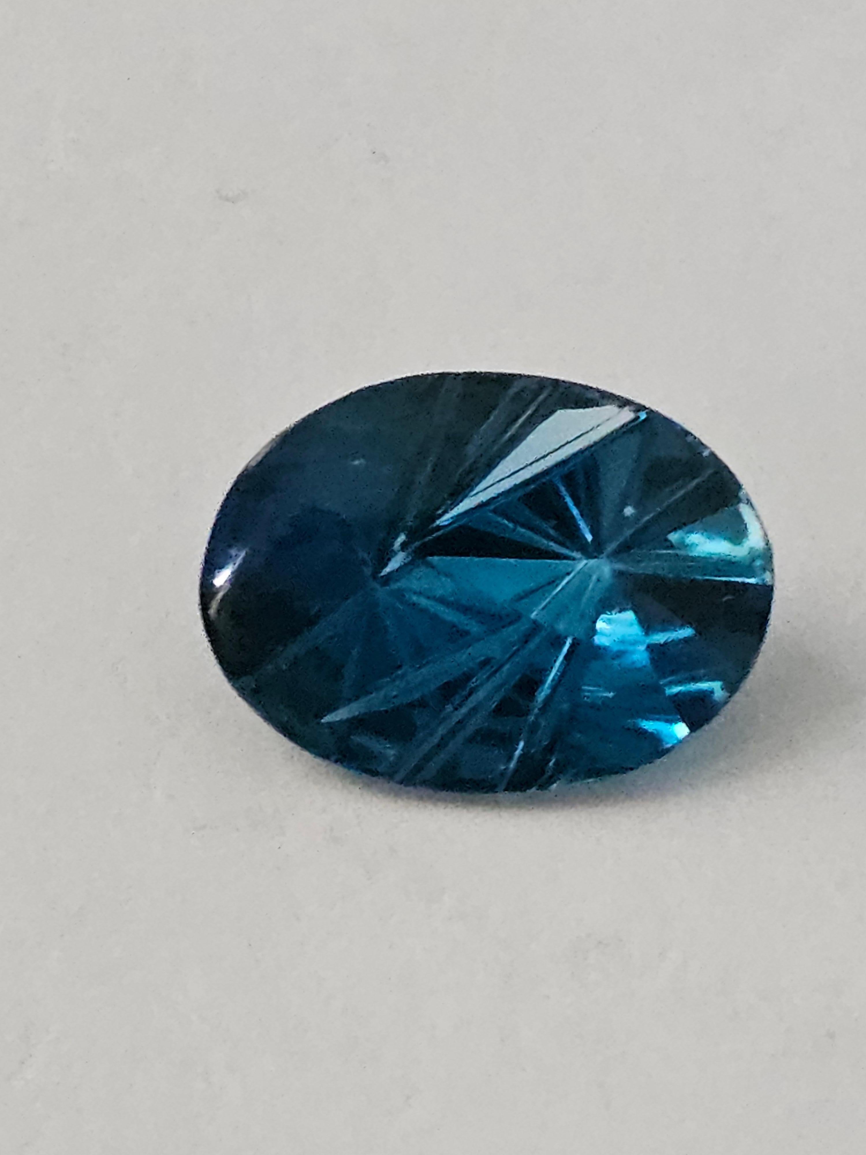 Oval Cut 5 ct Oval London Blue Topaz 12X10 Fantasy Cut For Sale
