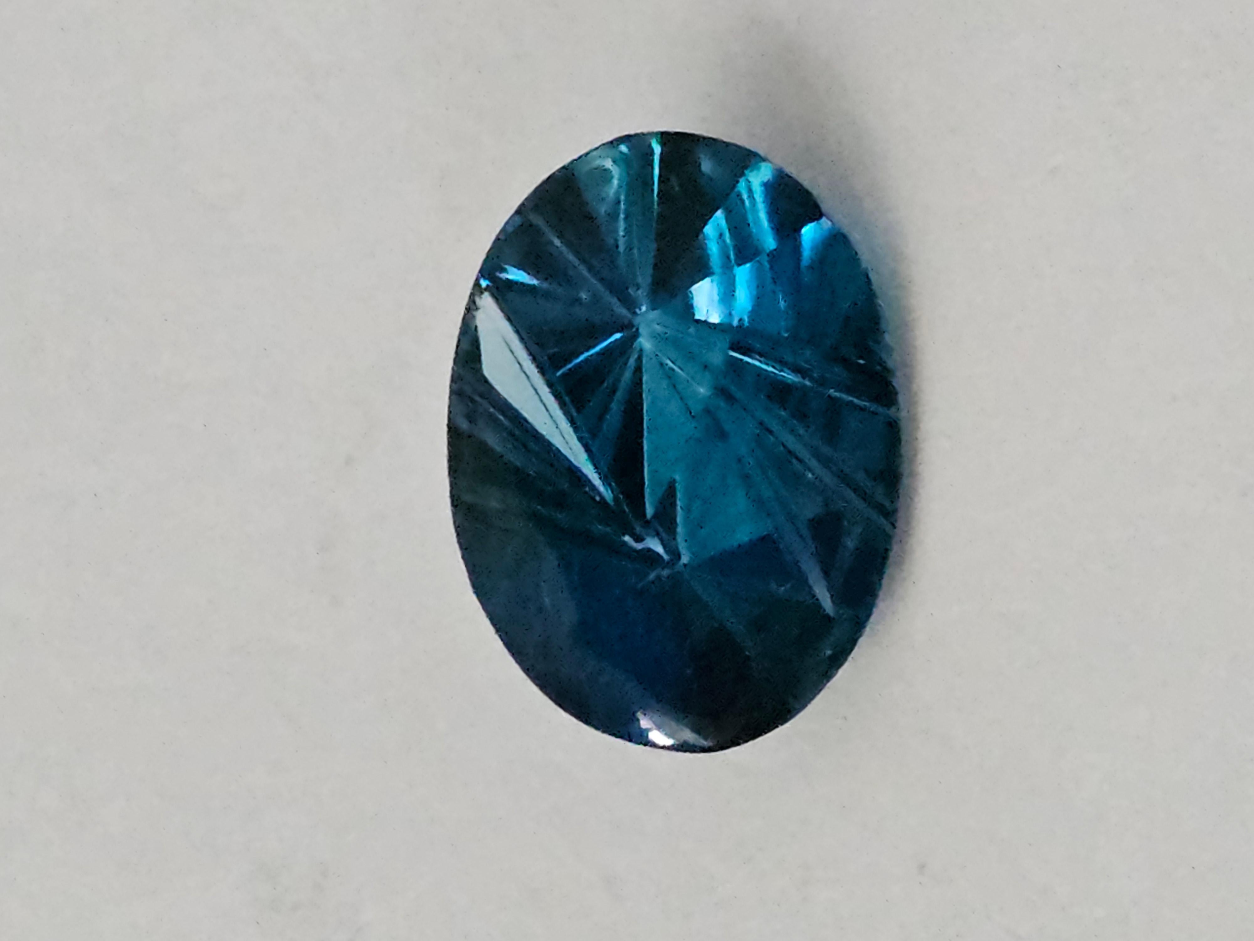 5 ct Oval London Blue Topaz 12X10 Fantasy Cut For Sale 4