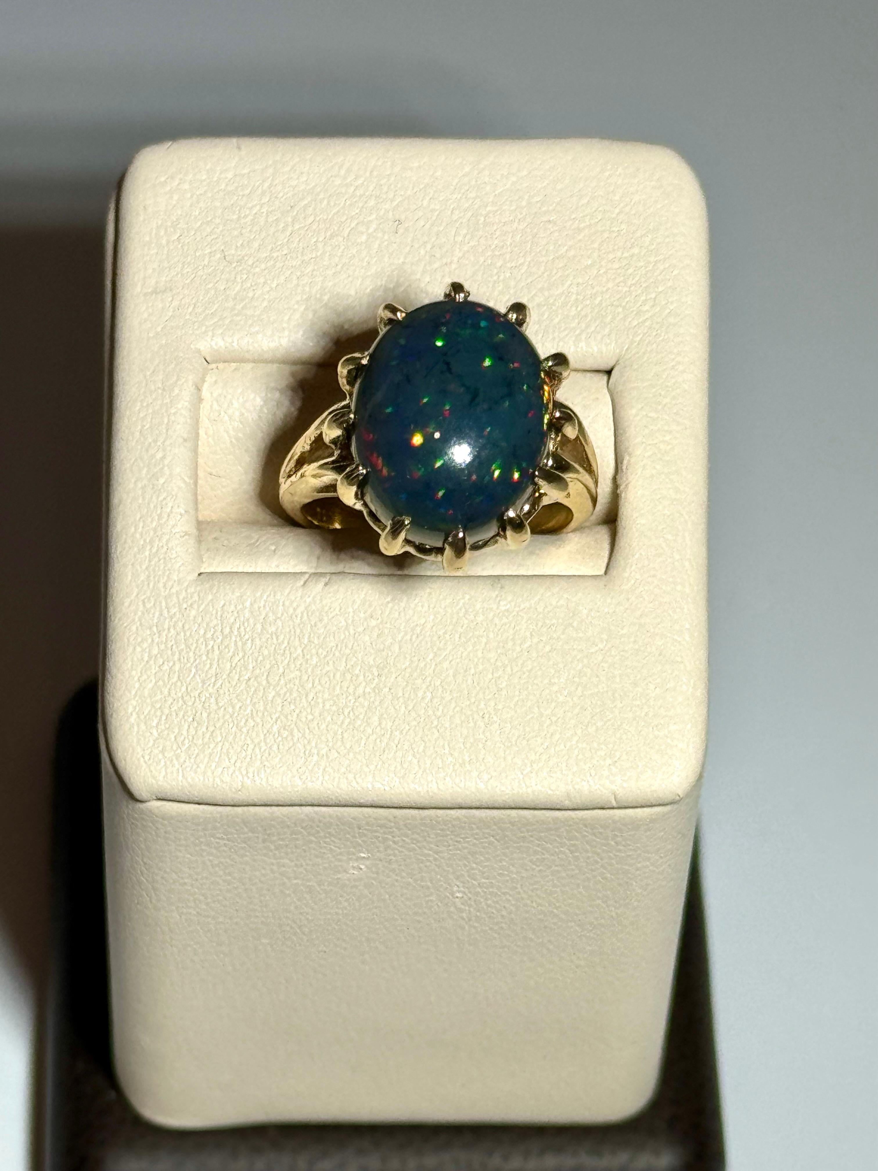 5 Ct Oval Shape Black Australian Opal Cocktail Ring 14 Kt Yellow Gold , Unisex In Excellent Condition For Sale In New York, NY