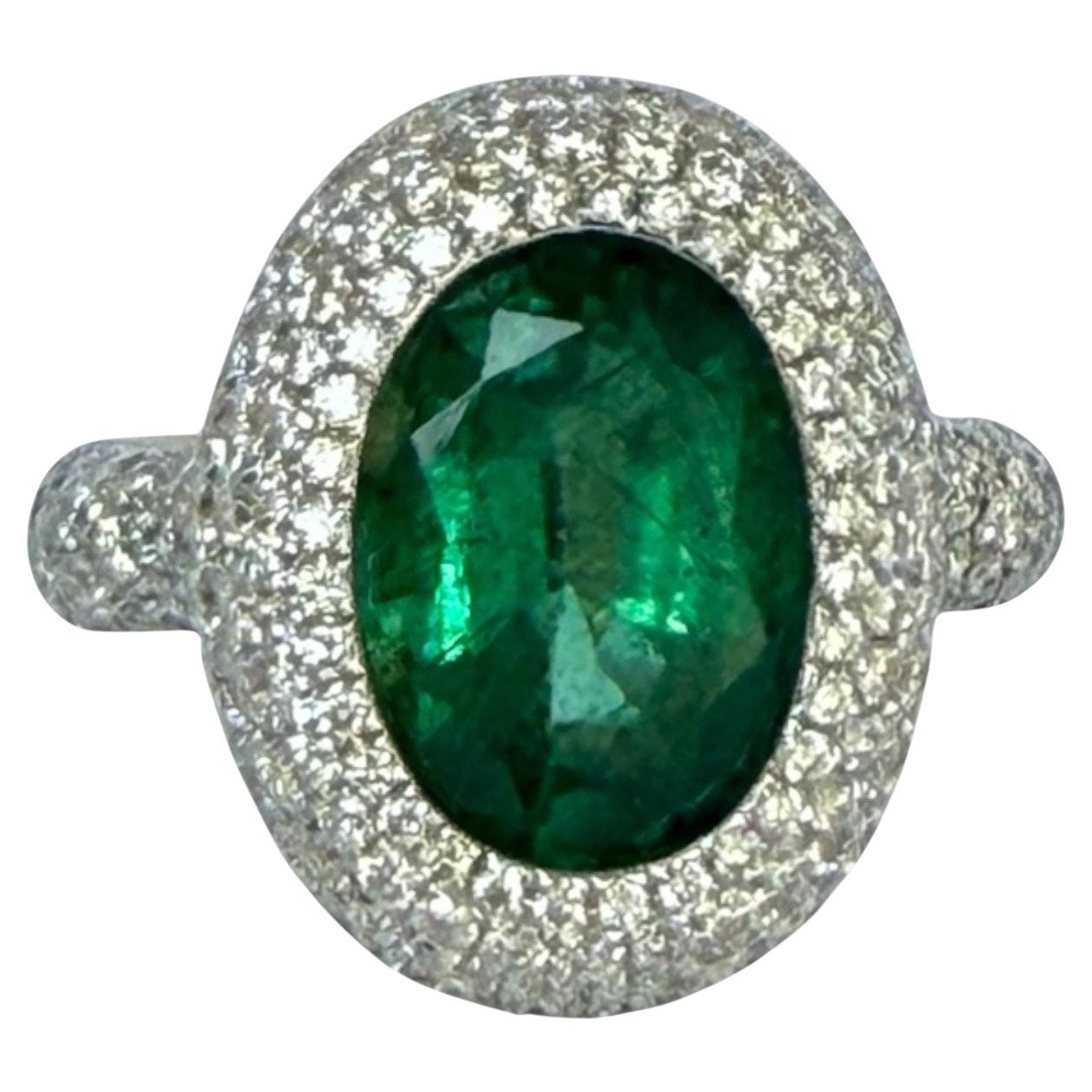 5 CT Significant Emerald Solitaire (Oval Shape) and brilliant cut diamond ring