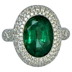 5 CT Significant Emerald Solitaire (Oval Shape) and brilliant cut diamond ring