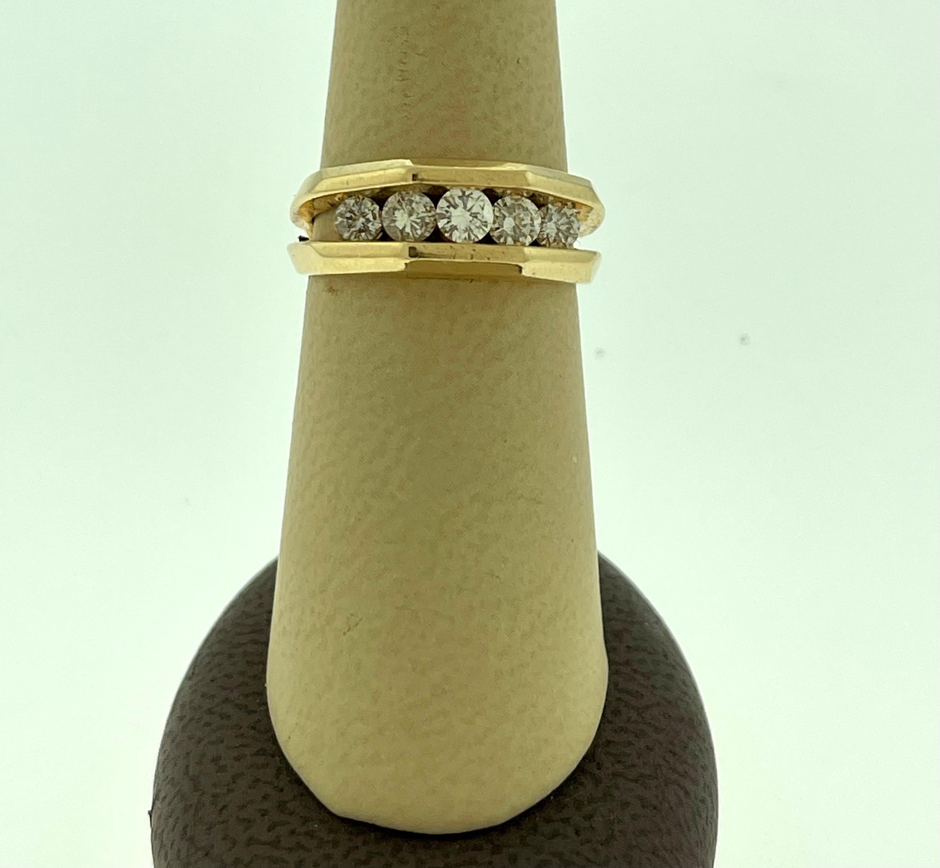 gold ring with 5 diamonds