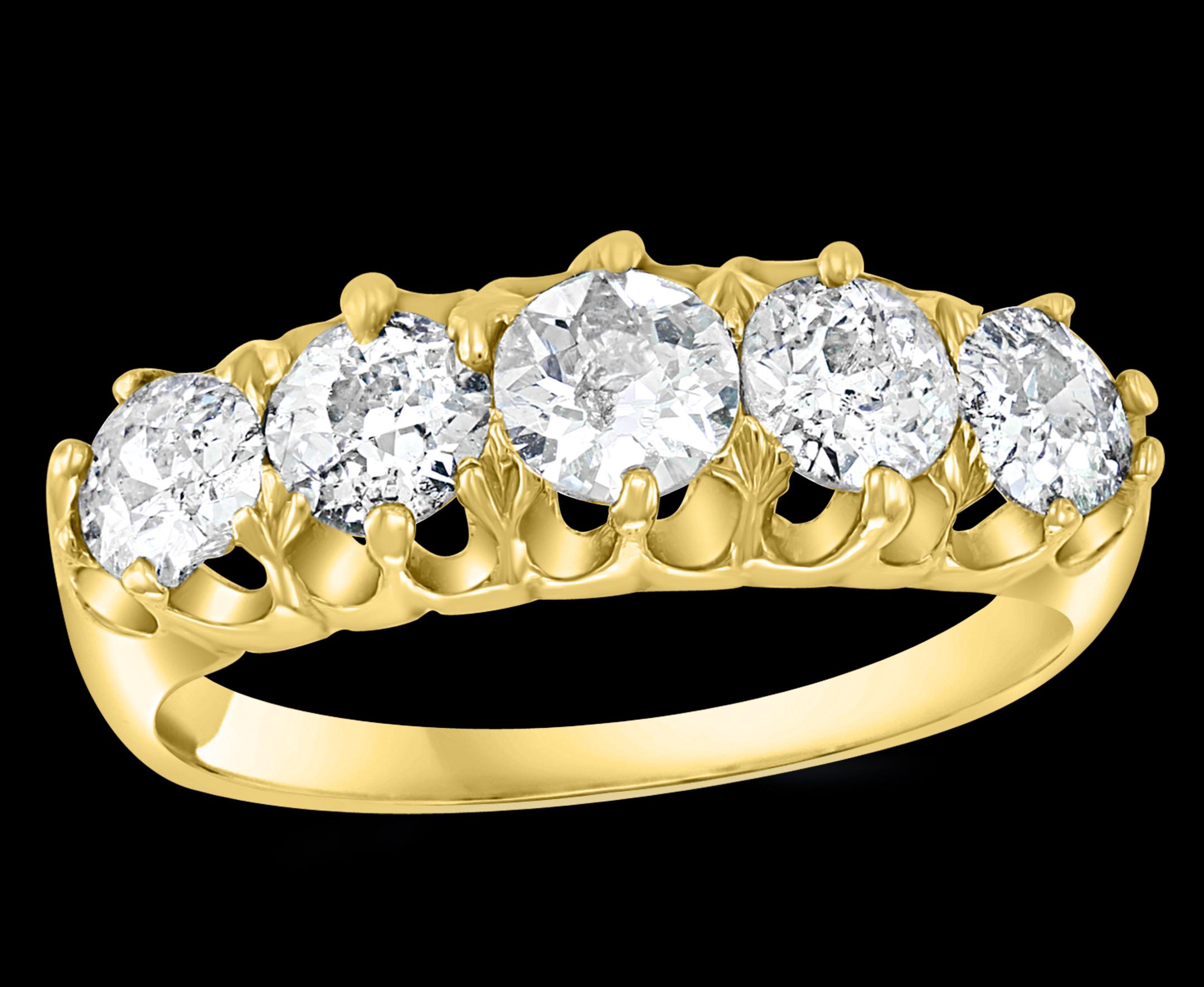 5 Diamonds , Unisex 1-Row Diamond  Band Ring in 14 Karat  Yellow Gold Size 7
This is a Prong setting   ring  from our affordable  premium wedding collection.
 5  round diamonds Eye Clean quality are set in  a row in 14 karat yellow gold .
Ring size