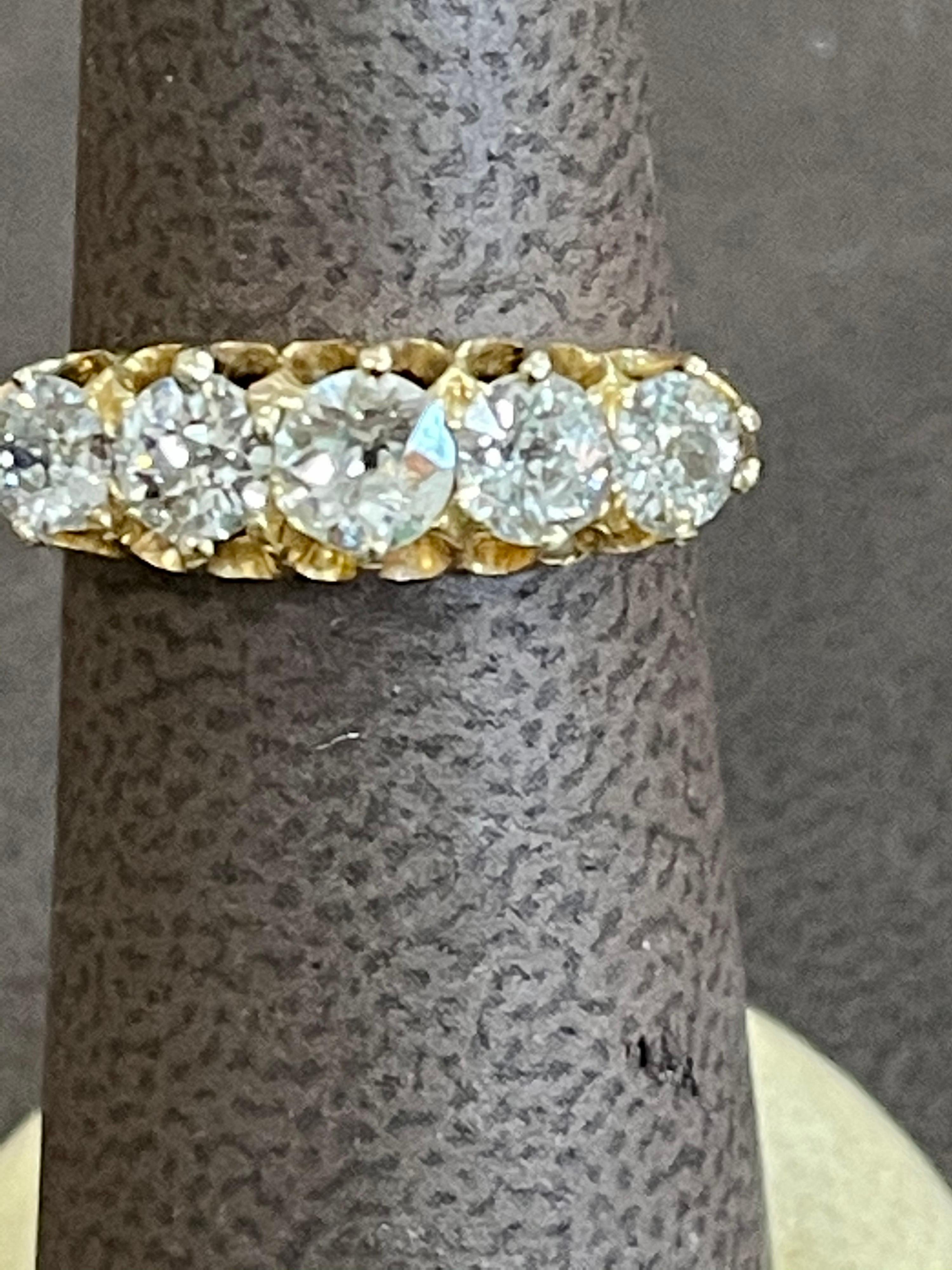 gold ring with 5 diamonds