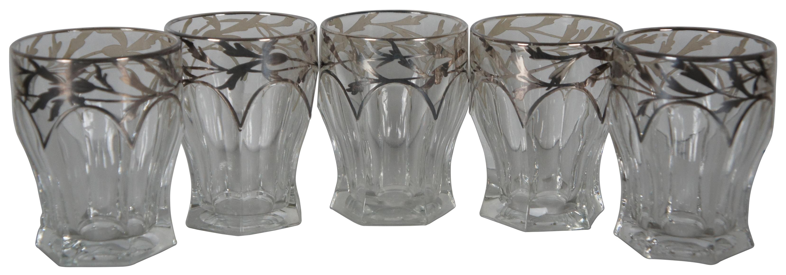 Set of five antique low ball glasses with a scalloped floral silver overlay at the rim. 
 