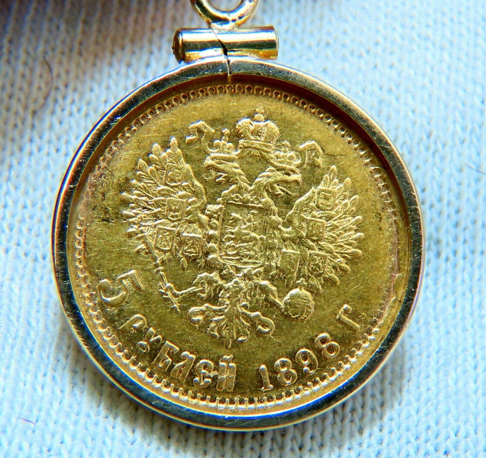 5 Ducat.

22kt 1898 Austrian Coin Pendant

14kt. Handmade Frame

Grand total weight: 
7.9 grams
Measures:

19mm diameter

17.5 inch necklace.