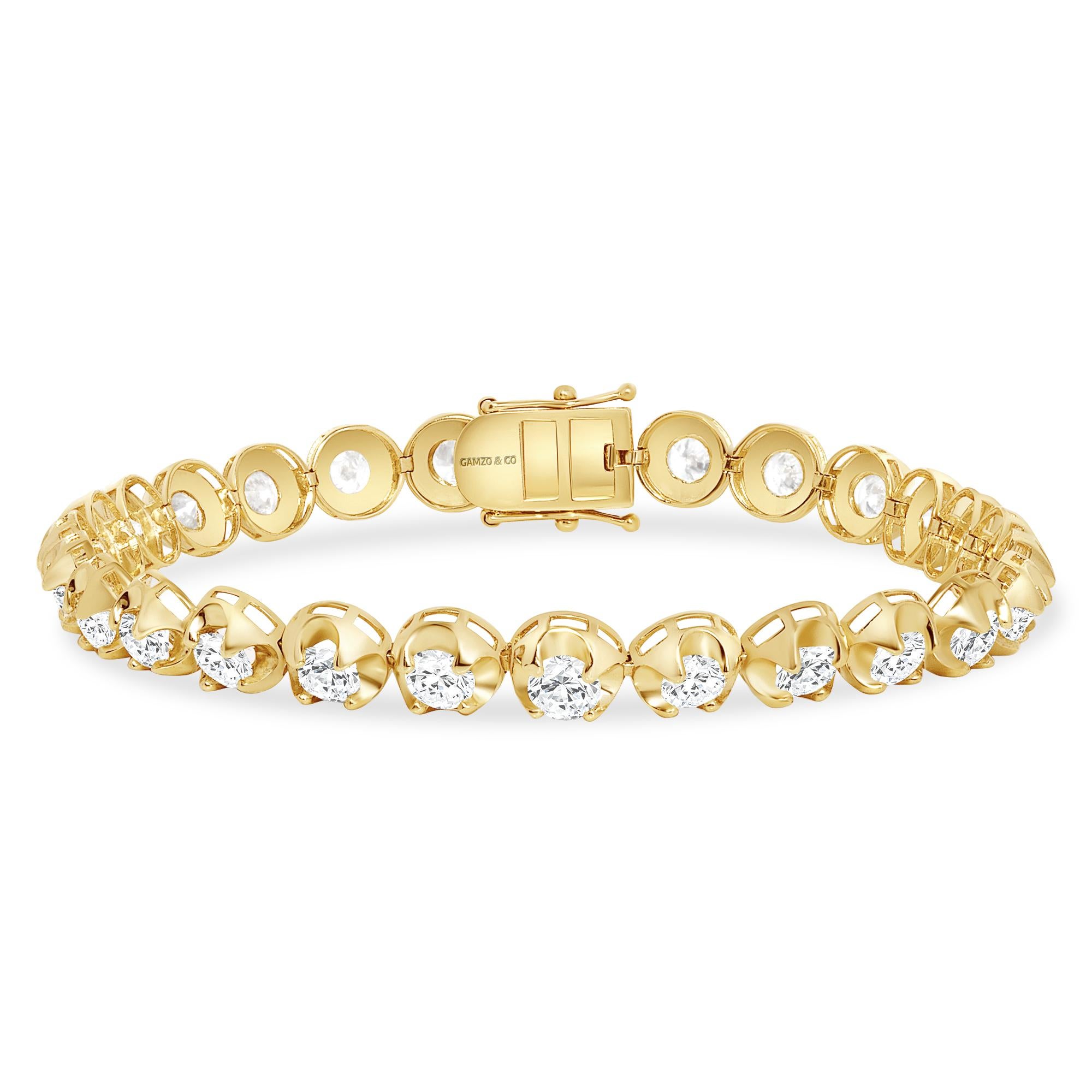 These beautiful round diamonds dance around your wrist as they absorb light and attention.
Metal: 14k Gold
Diamond Cut: Round
Diamond Total Carats: 7ct
Diamond Clarity: VS
Diamond Color: F
Color: Yellow Gold
Bracelet Length: 5 Inches 
Included with