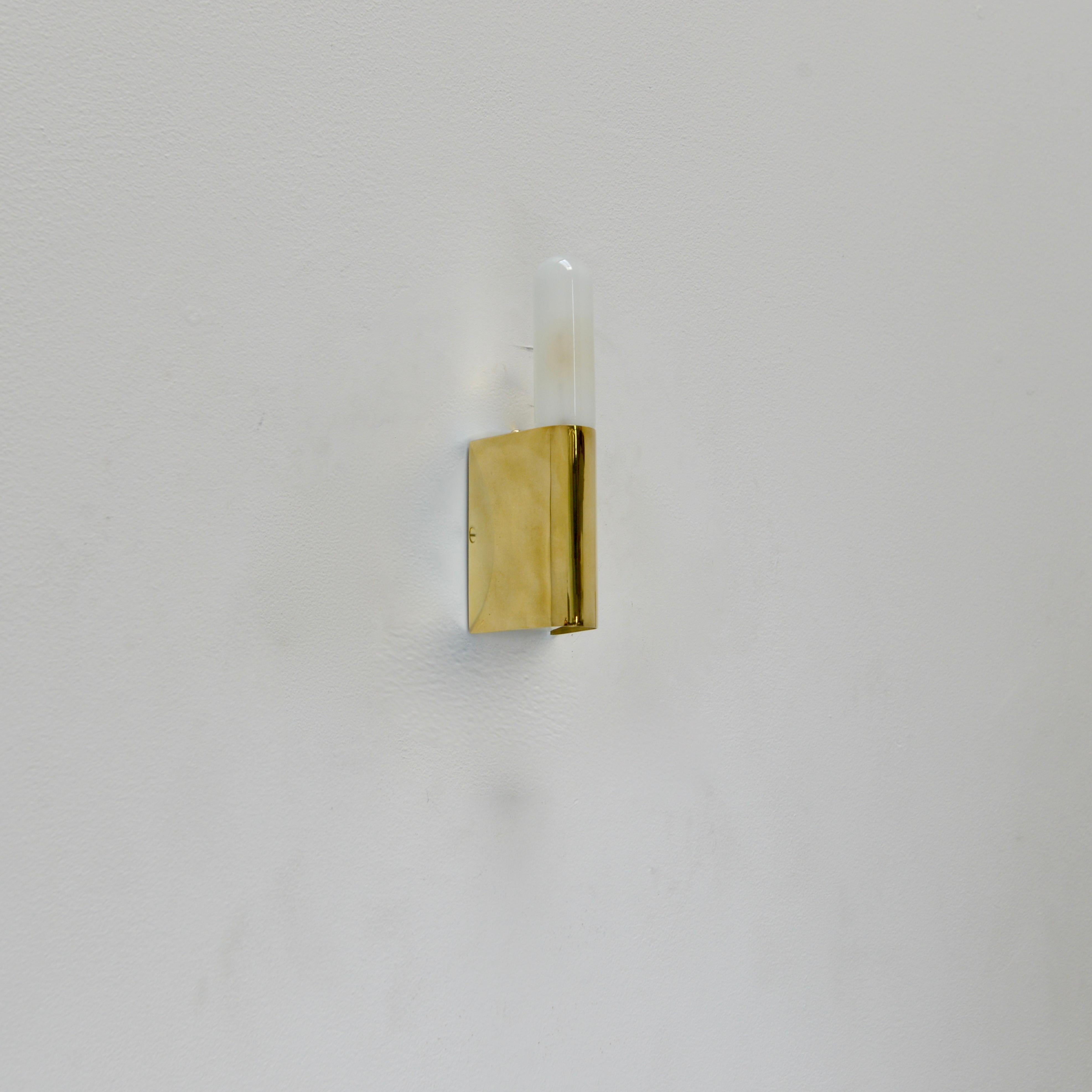 A wonderful linear sconce from 1960s, Italy. Made from brass and steel, partially restored, with original finish. (1) E26 medium based socket. Uses T-shaped bulb. Special j-box required. (see last image) Currently wired for use in the US. Lightbulbs