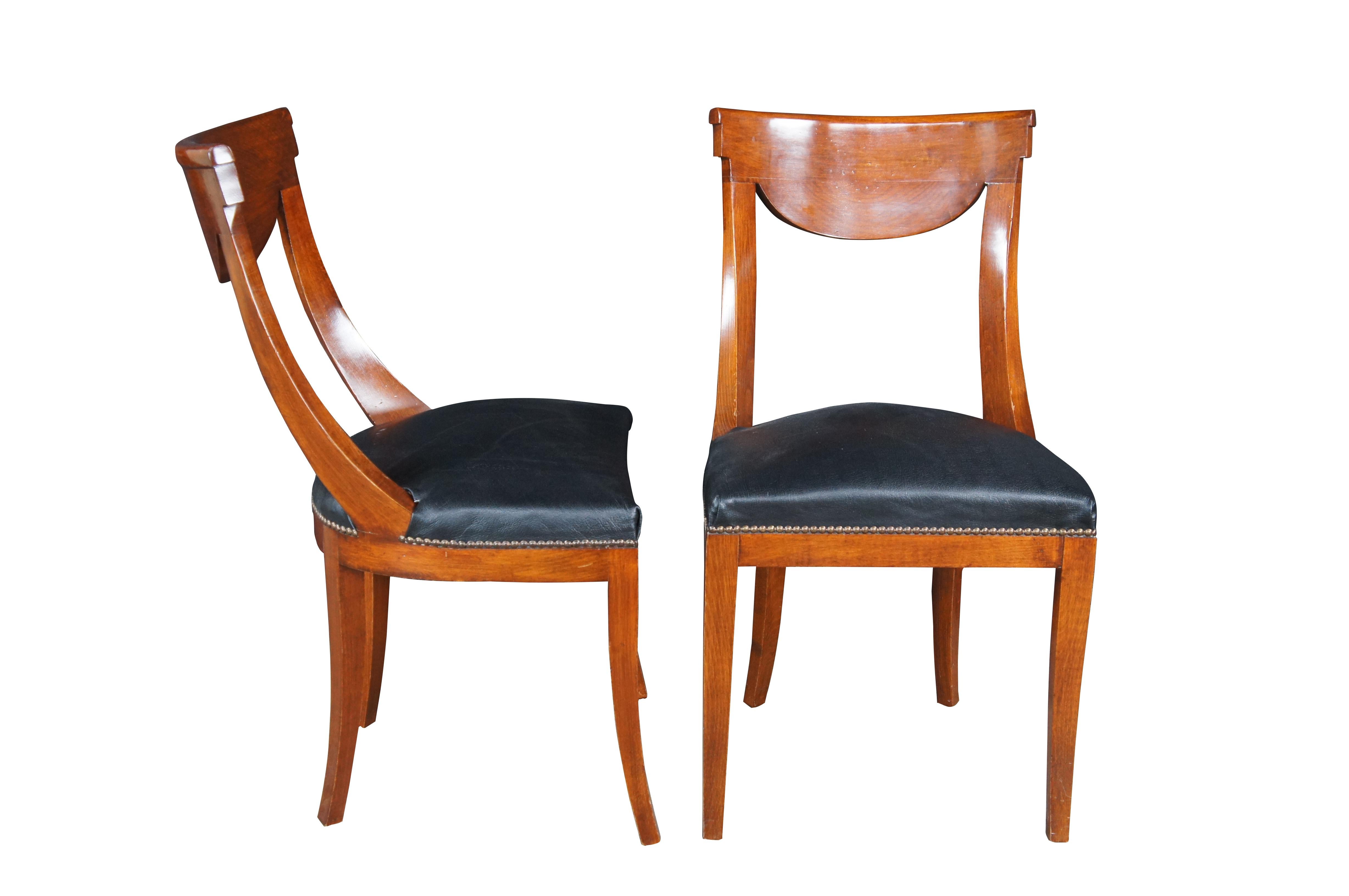Five vintage Italian Fiorini Klismos side dining chairs. Made of solid cherry featuring Biedermeier and Regency styling with sculpted open back, nailhead trim and flared legs.  Made in Italy.

Dimensions:
19