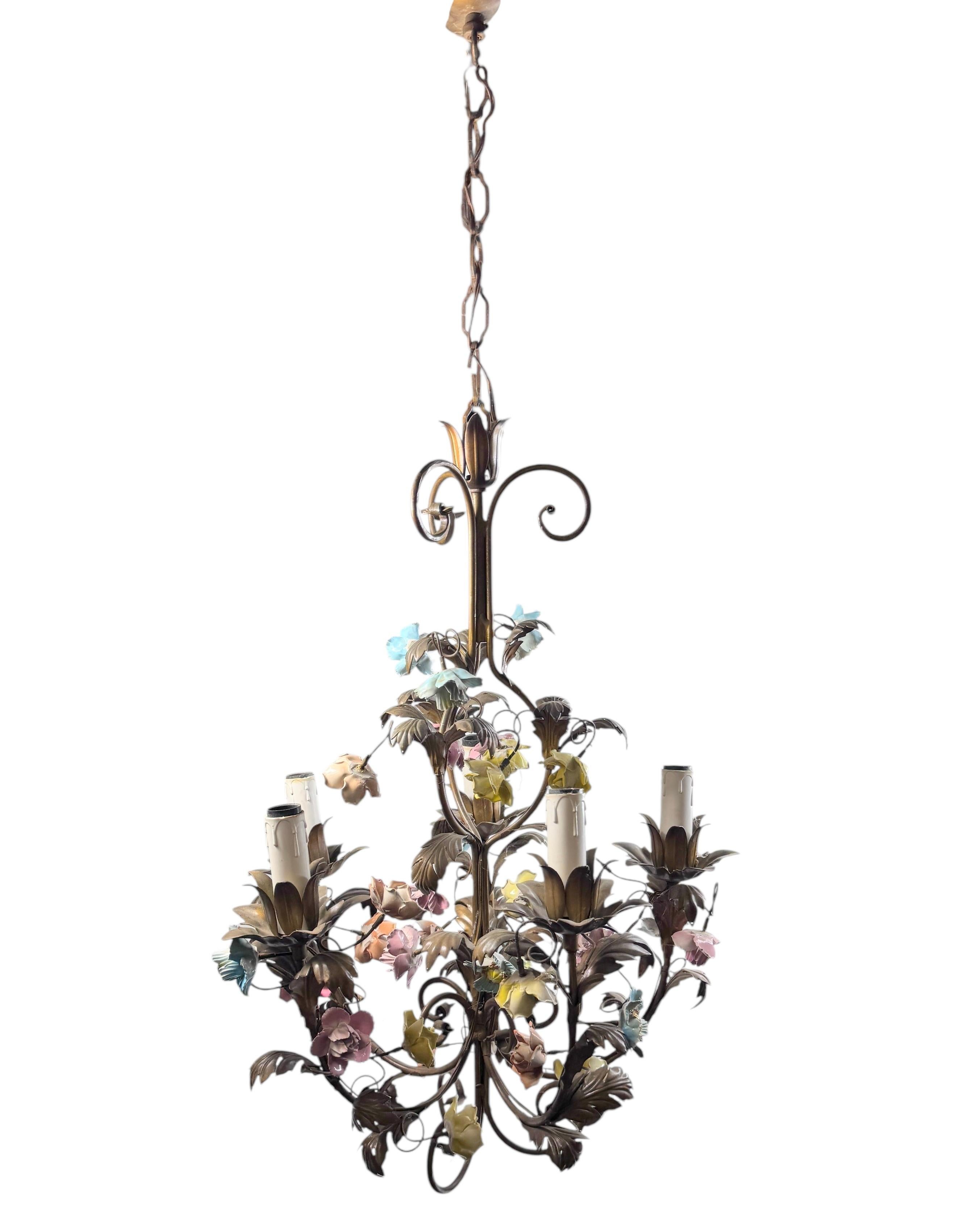 Add a touch of Italian opulence to your home with this charming chandelier! Perfect flowers, made of Majolica, to enhance any chic or eclectic home. We'd love to see it hanging in an entryway as a charming welcome home. The chain with canopy is