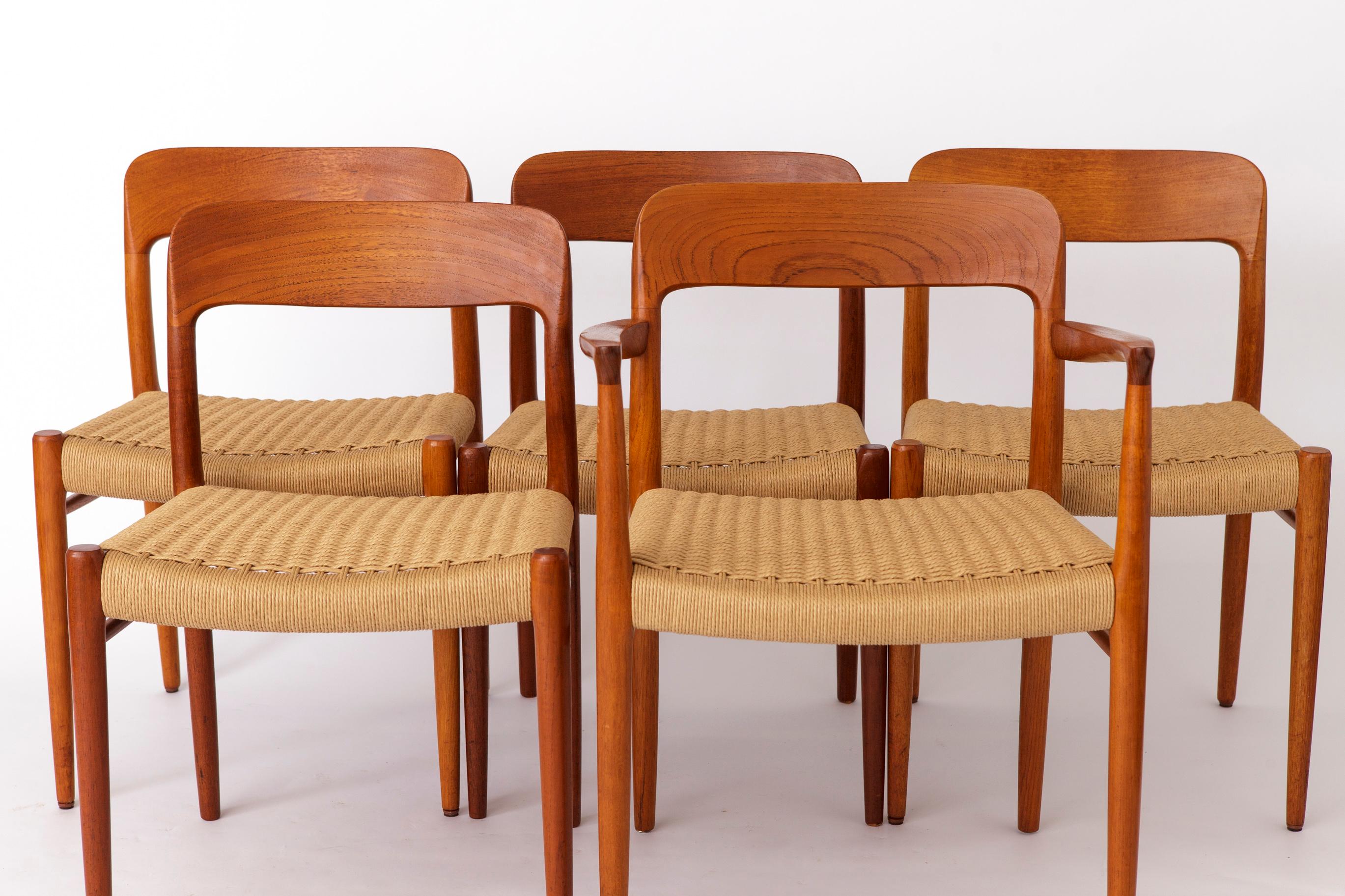 Set of 5 Niels Otto Moller Chairs (1 Armchair + 4 Side Chairs)
Model 75 from the 1950s, first designed in 1956

Enhance your dining area with this elegant set of five Niels Otto Moller chairs, including one armchair and four side chairs. The listed
