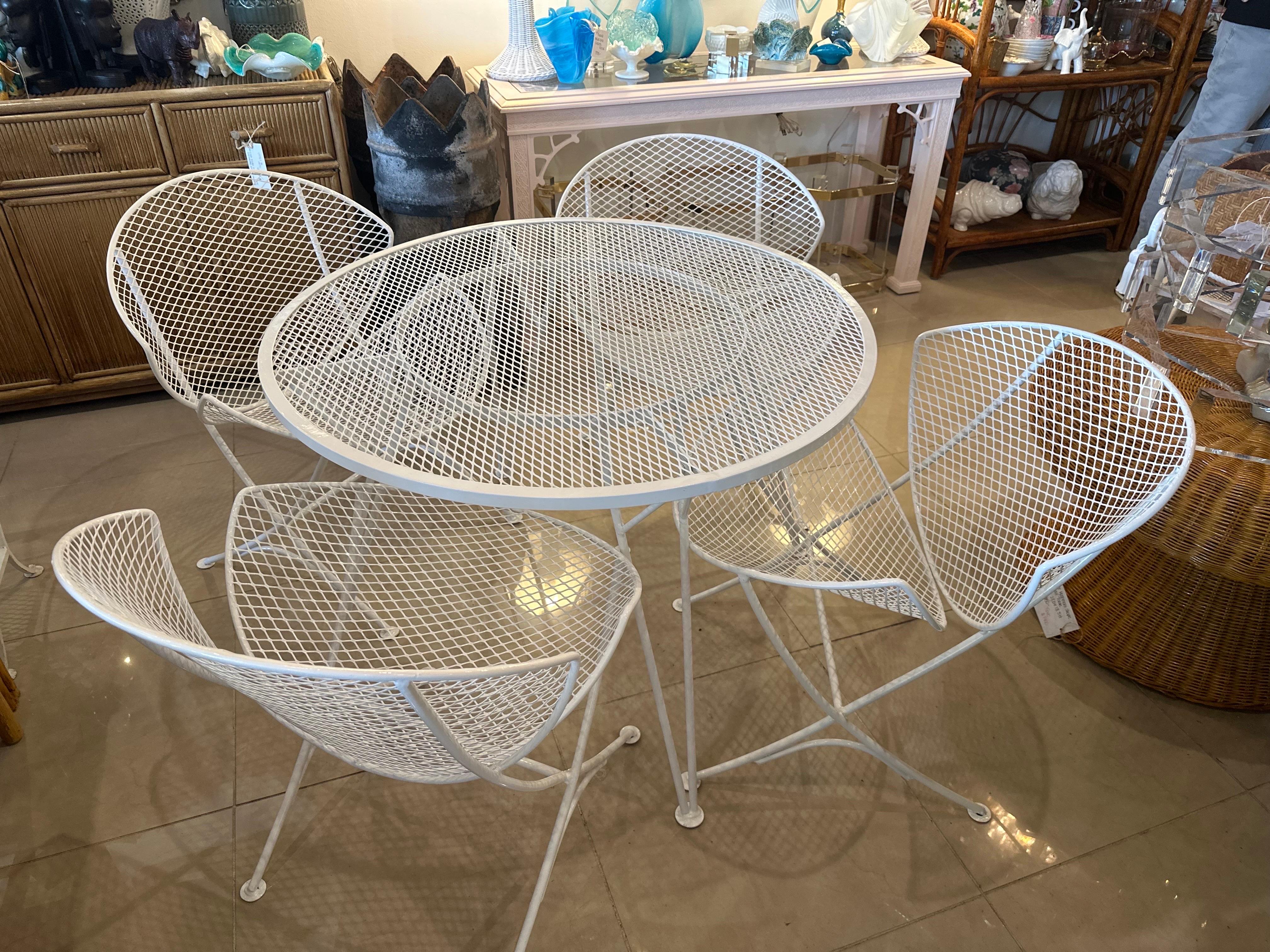 Mid Century Modern 5 Piece dining table patio outdoor sunroom set & 4 chairs. Design by Maurizio Tempestini for John Salterini. This set has been freshly powder-coated in white.  Chairs dimensions: 27.5 H x 19.5 D x 23 W Table dimensions: 36 D x