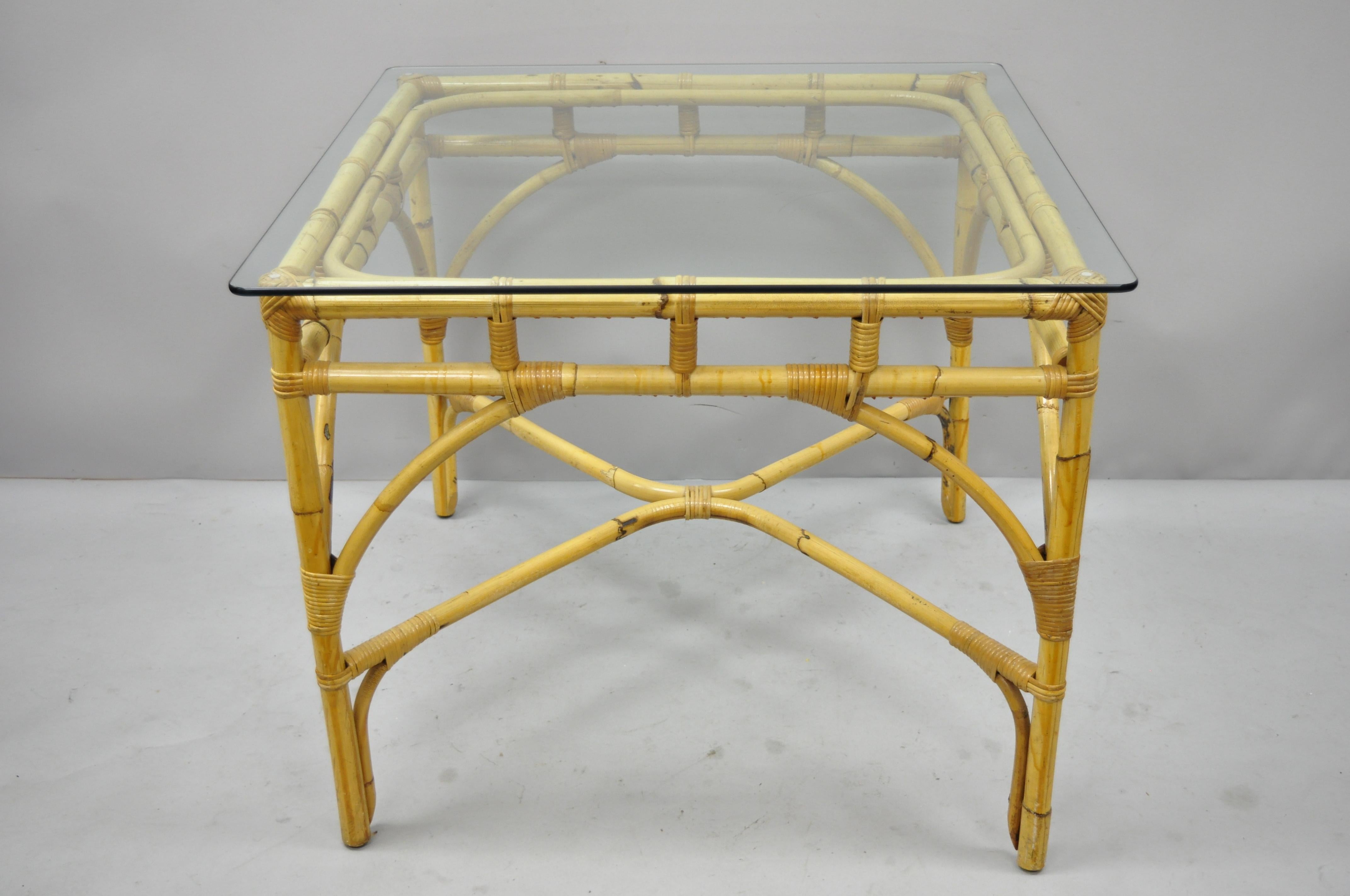5-piece bamboo rattan faux bamboo Chinese Chippendale boho chic dining set. Listing includes (4) side chairs, (1) glass top dining table, square glass top, circa mid-20th century. Measurements: side chairs: 36