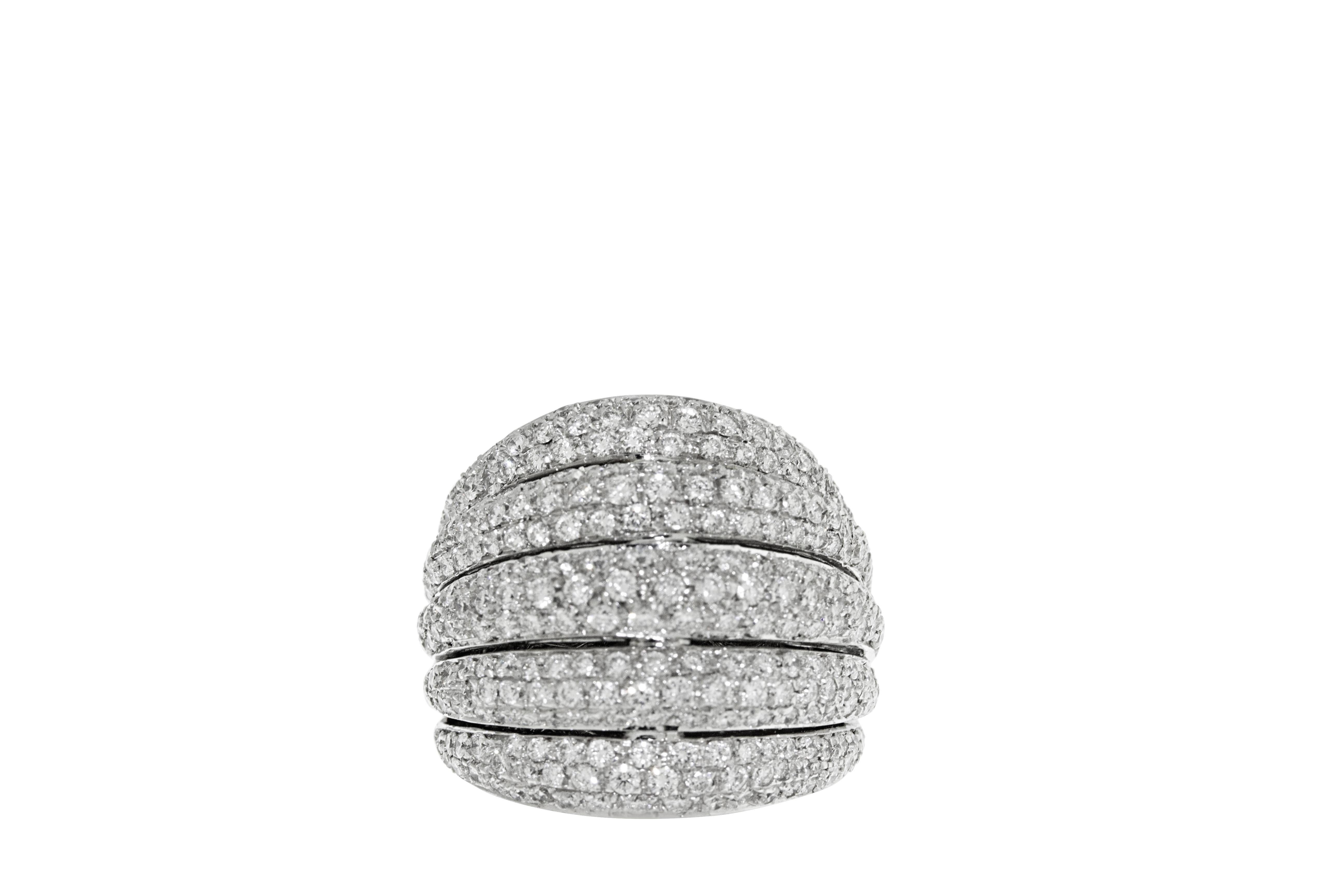 18K white gold  fashion cocktail ring featuring 3.14 carats of G VS pave diamonds. 21 grams of 18 K white gold. Approximately 1 inch wide. Size 7 3/4. Made in Italy.

Can be sized down upon request. 

Viewings available in our NYC showroom by