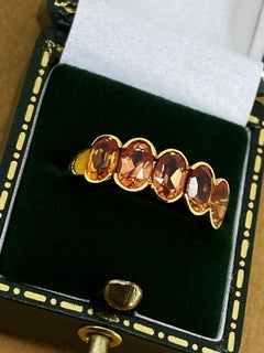 5-Stone 3.75ct Orange Sapphire Half-Hoop Ring in 18K Yellow Gold Valued at $8500