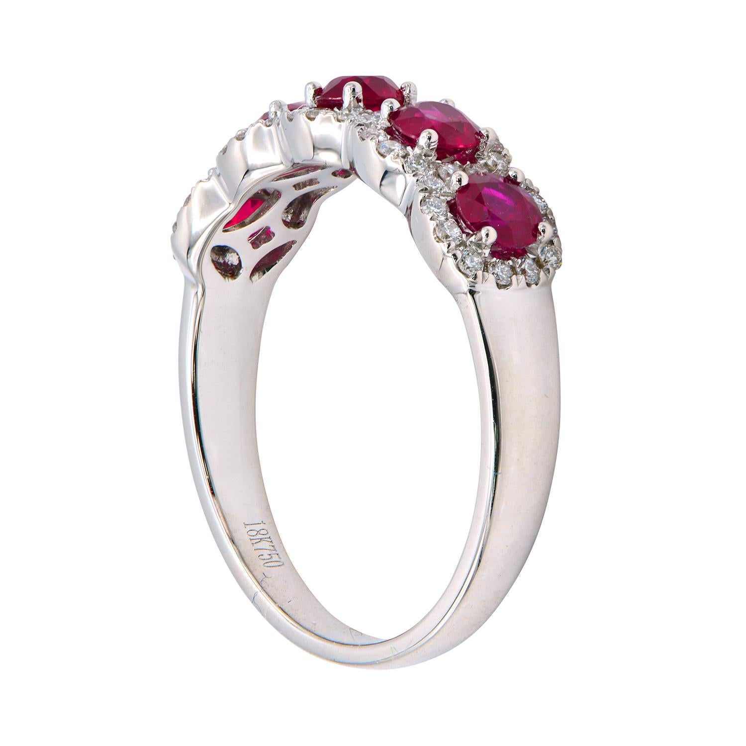 With this exquisite diamond band, style and glamour are in the spotlight. This 18-karat diamond and ruby band is made from 3.0 grams of gold. The top is adorned with one row of VS2, G color diamonds, made out of 52 diamonds totaling 0.19 carats, and
