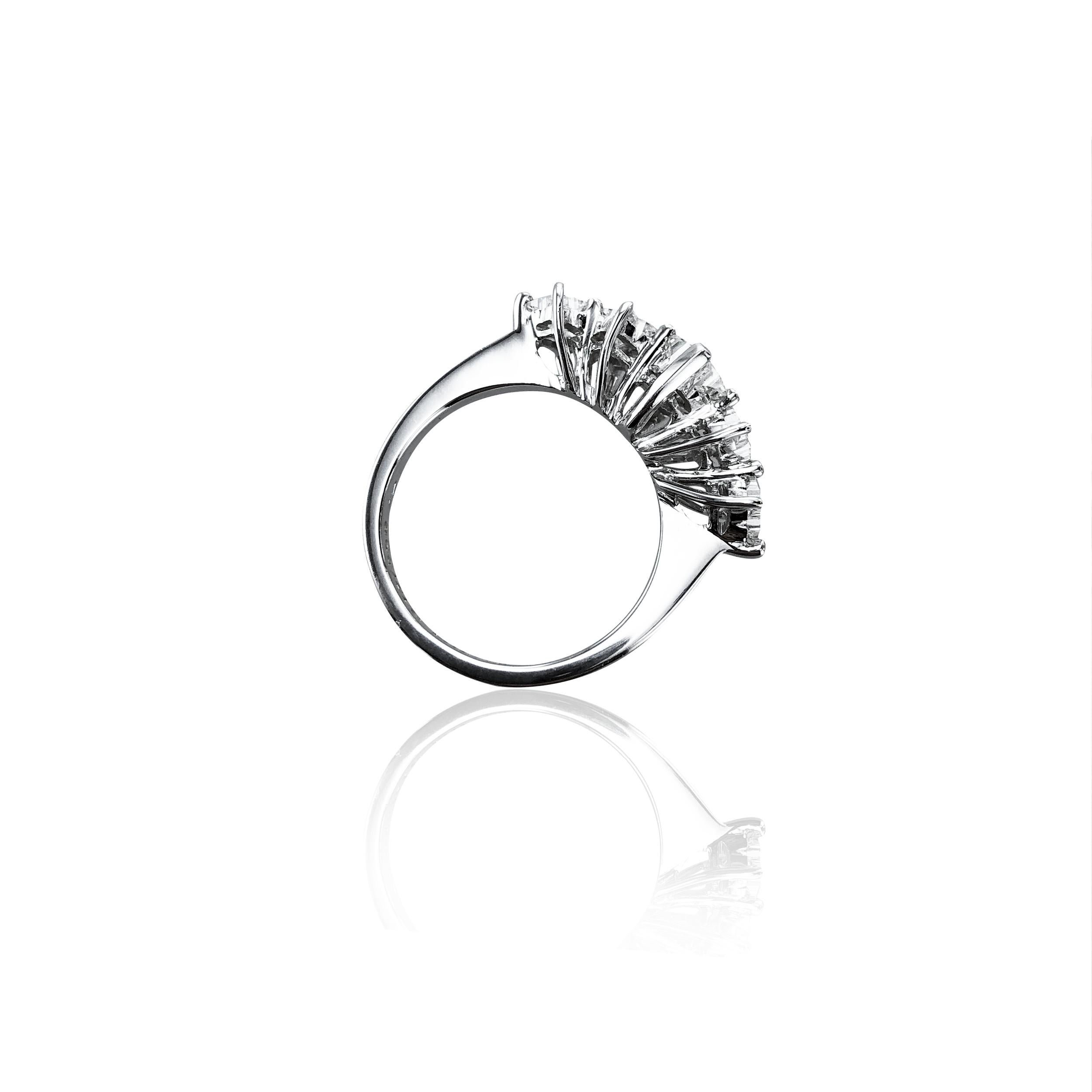 This 5 Stone 1.25 Carat of Diamonds is set in an 18Kt White Gold cocktail ring.
Striking and wearable for special occasions and every day, it graces the finger with elegance and style. 

Produced, designed and certified in Italy by Amin Luxury.