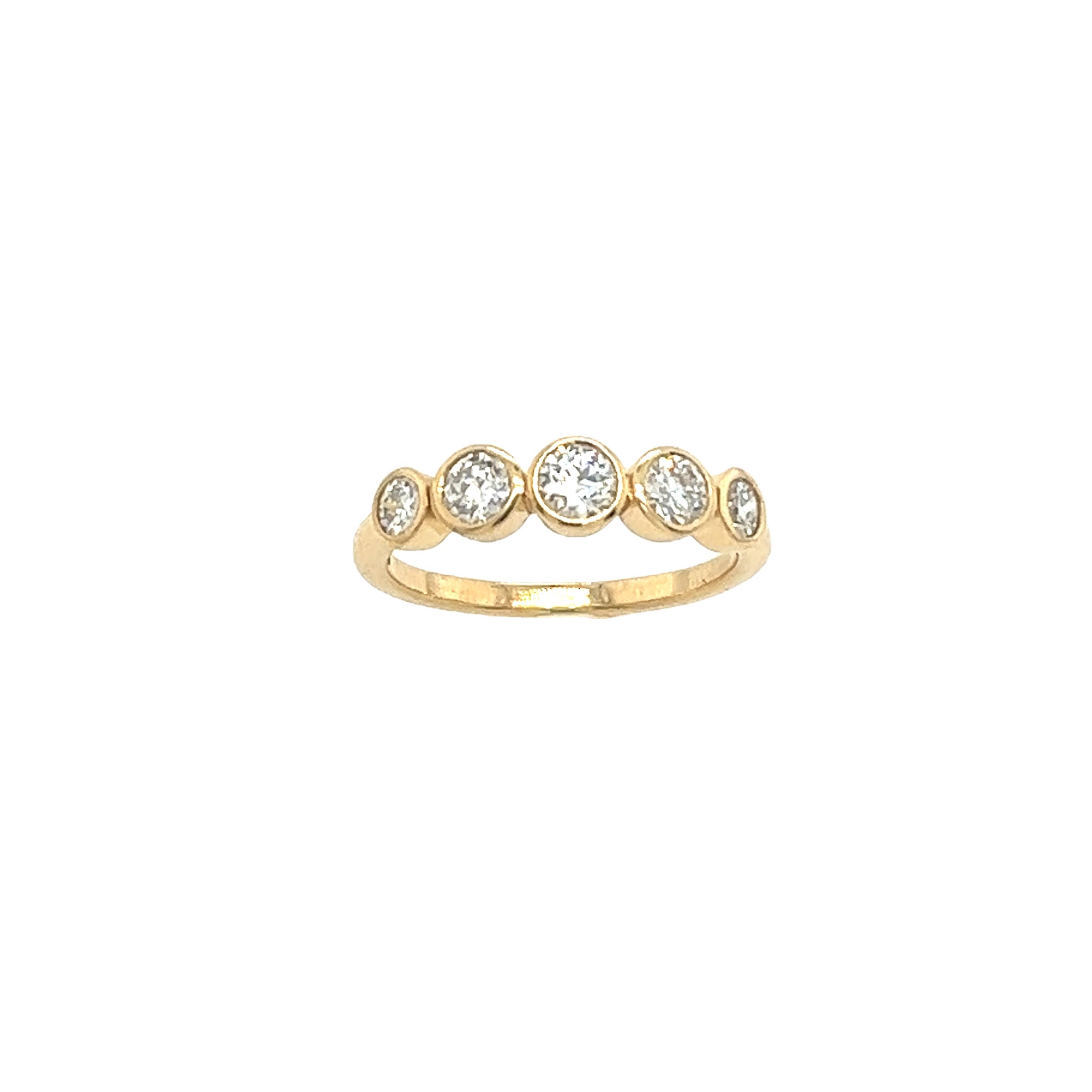 This magnificent diamond 5-stone ring is set with 0.70ct H colour SI1 clarity round brilliant cut diamonds,
Set in 18ct yellow gold setting.
This ring is elegant and beautiful for wedding ring or anniversary ring.
Total Diamond Weight: 0.70ct