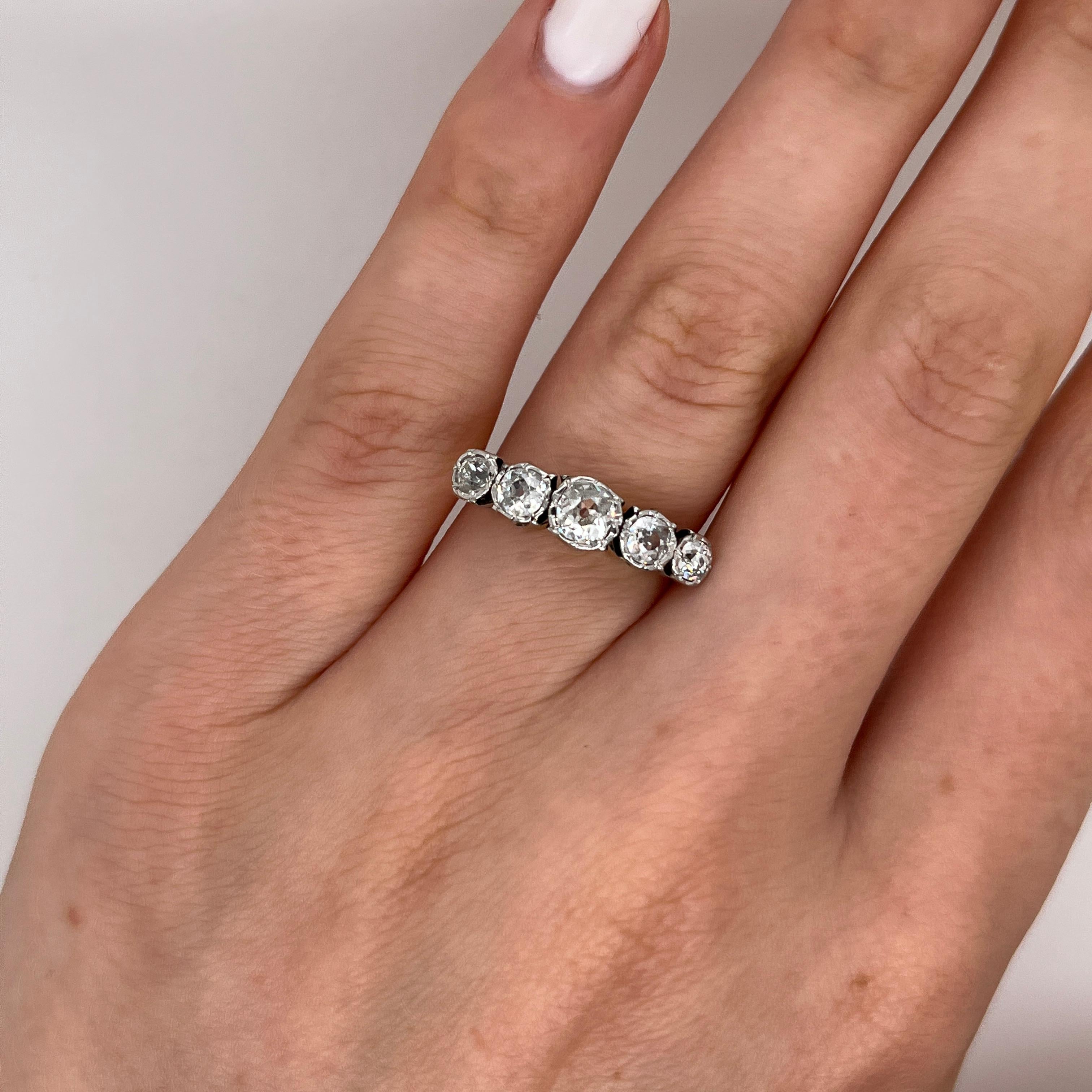 This timeless 5-stone diamond ring showcases a total of 1.0ct of sparkling old cut natural diamonds, beautifully 
set across a classic band crafted from 18ct yellow and white gold. 
Total Diamond Weight: 1.0ct 
Diamond Colour: H
Diamond Clarity: