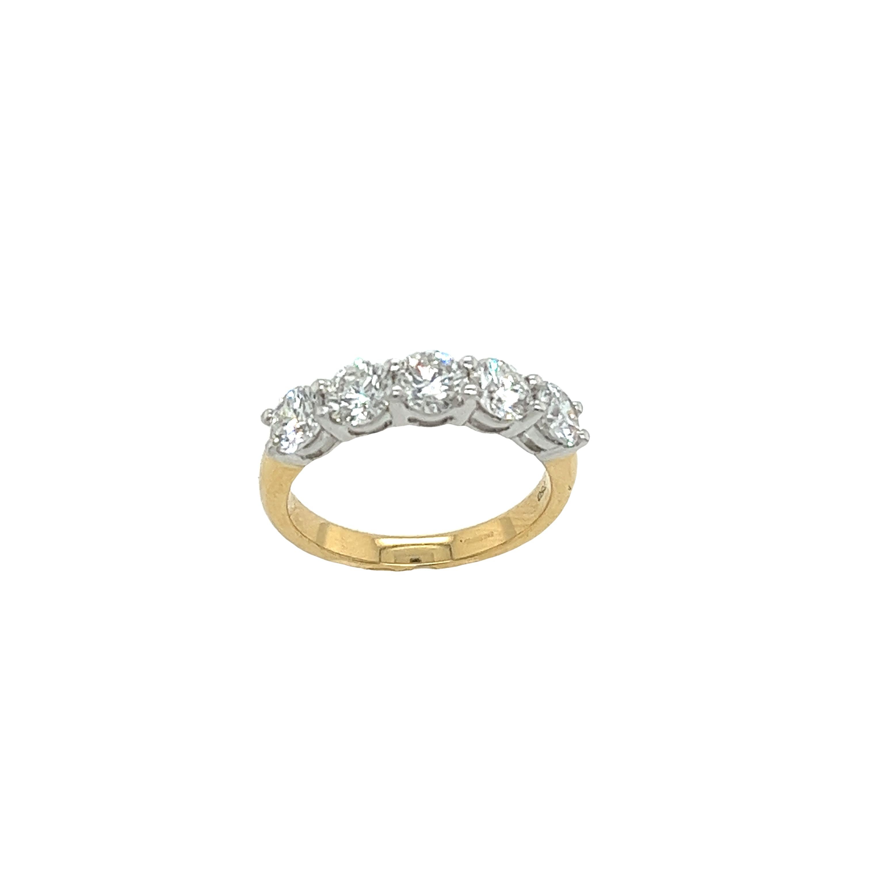 This magnificent diamond 5-stone ring
is set with 1.70ct G colour VS1 clarity round brilliant cut diamonds,
Set in 18ct white & yellow gold setting.
This ring is elegant and beautiful for a wedding ring or anniversary ring.
Total Diamond Weight: