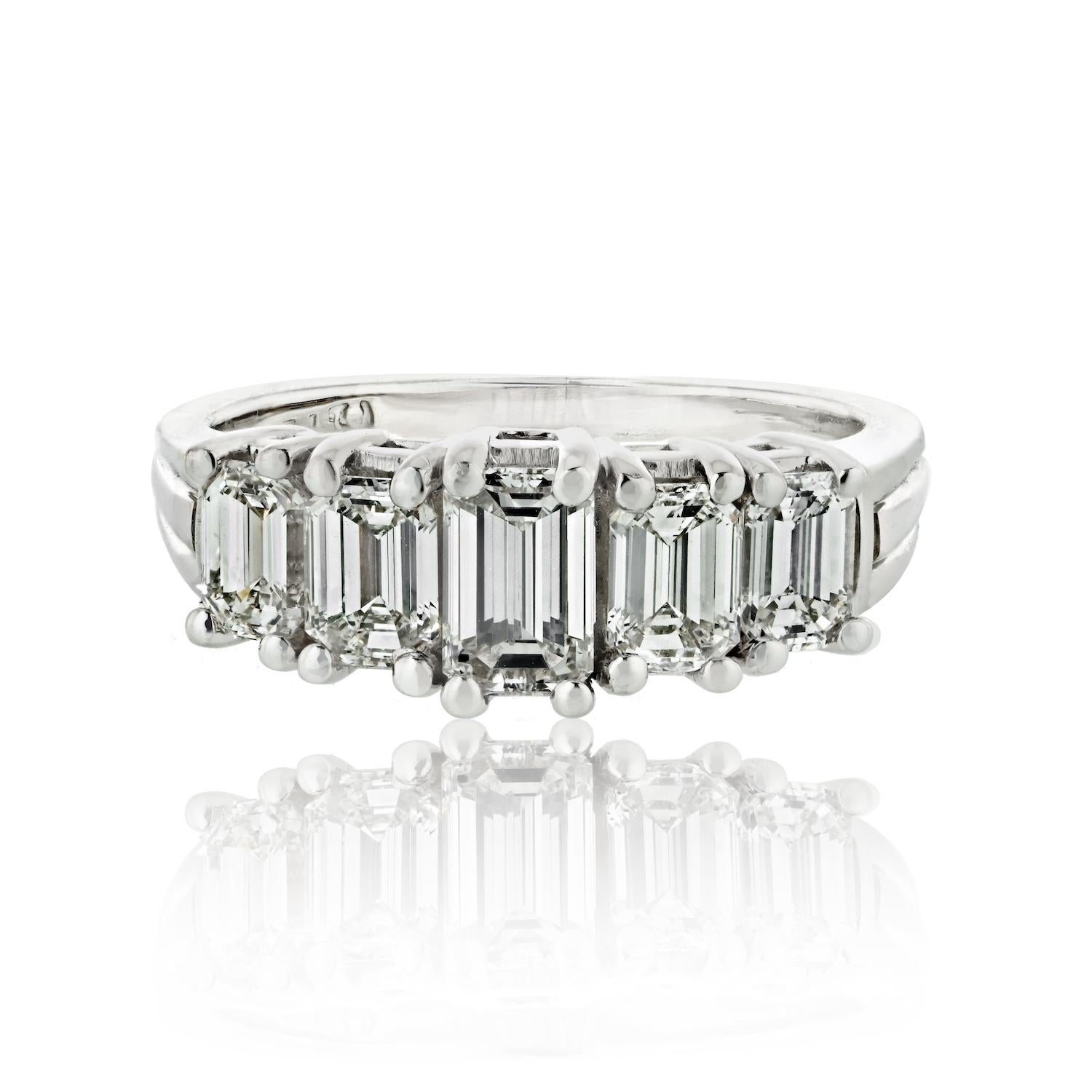 Embrace everlasting love with our Platinum 2.00cttw Five Stone Emerald Cut Ring, a symbol of timeless elegance and enduring commitment. This exquisite ring is meticulously crafted to perfection, featuring five stunning emerald-cut diamonds set in