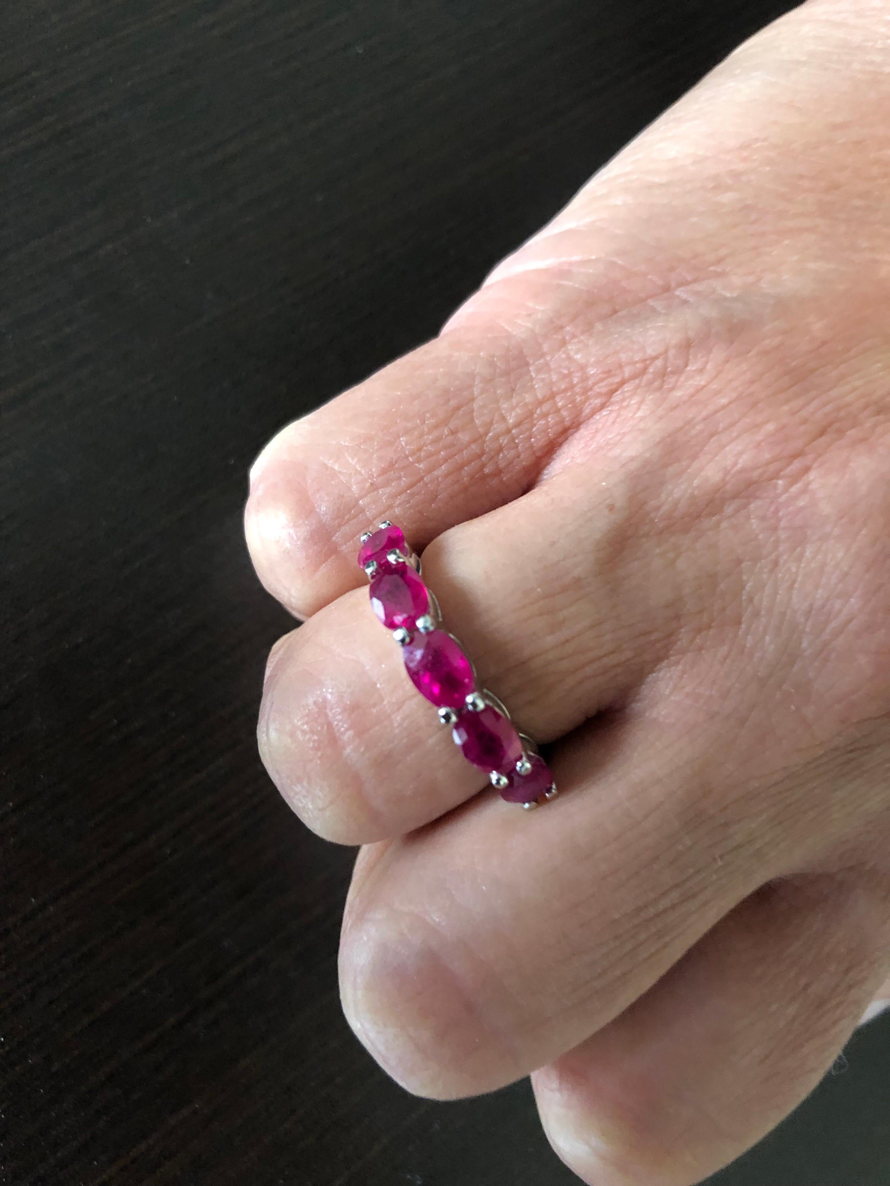 5 stone Oval Ruby ring set in 14K White gold. The oval stones weigh approximately 0.65 carats each. The total weight is 3.25 carats. The ruby stones are Burma. The ring is a size 6.5 and can be sized.