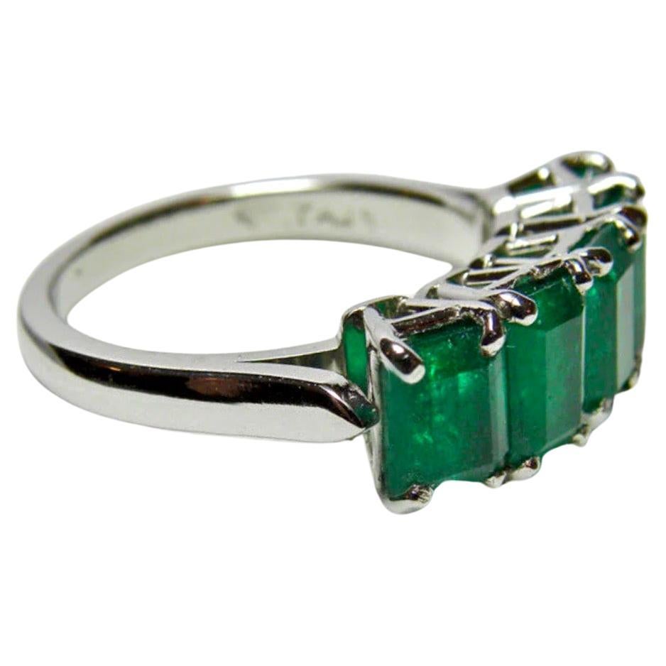 Stunning five-stone emerald band ring emerald cut natural Colombian emerald
Composition: Platinum
Primary Stone: AAA+ Colombian Natural Emerald
Shape or Cut: Emerald Cut 
Approx Emerald Weight:  (5 emeralds)
Measurement Emeralds: 6mm x 4mm
Average