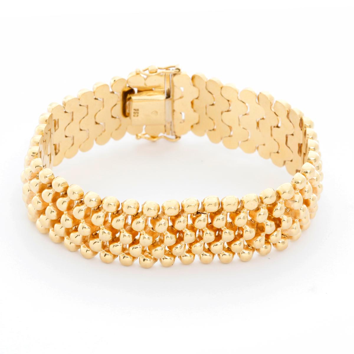 5 Stränge Goldperlenarmband  - Dieses Armband besteht aus 5 Strängen mit Perlen aus 18 Karat Gelbgold. Wiegt 34,30 Gramm und ist 6,35 Zoll und 5/8 Zoll breit. Pre-Owned mit Box.