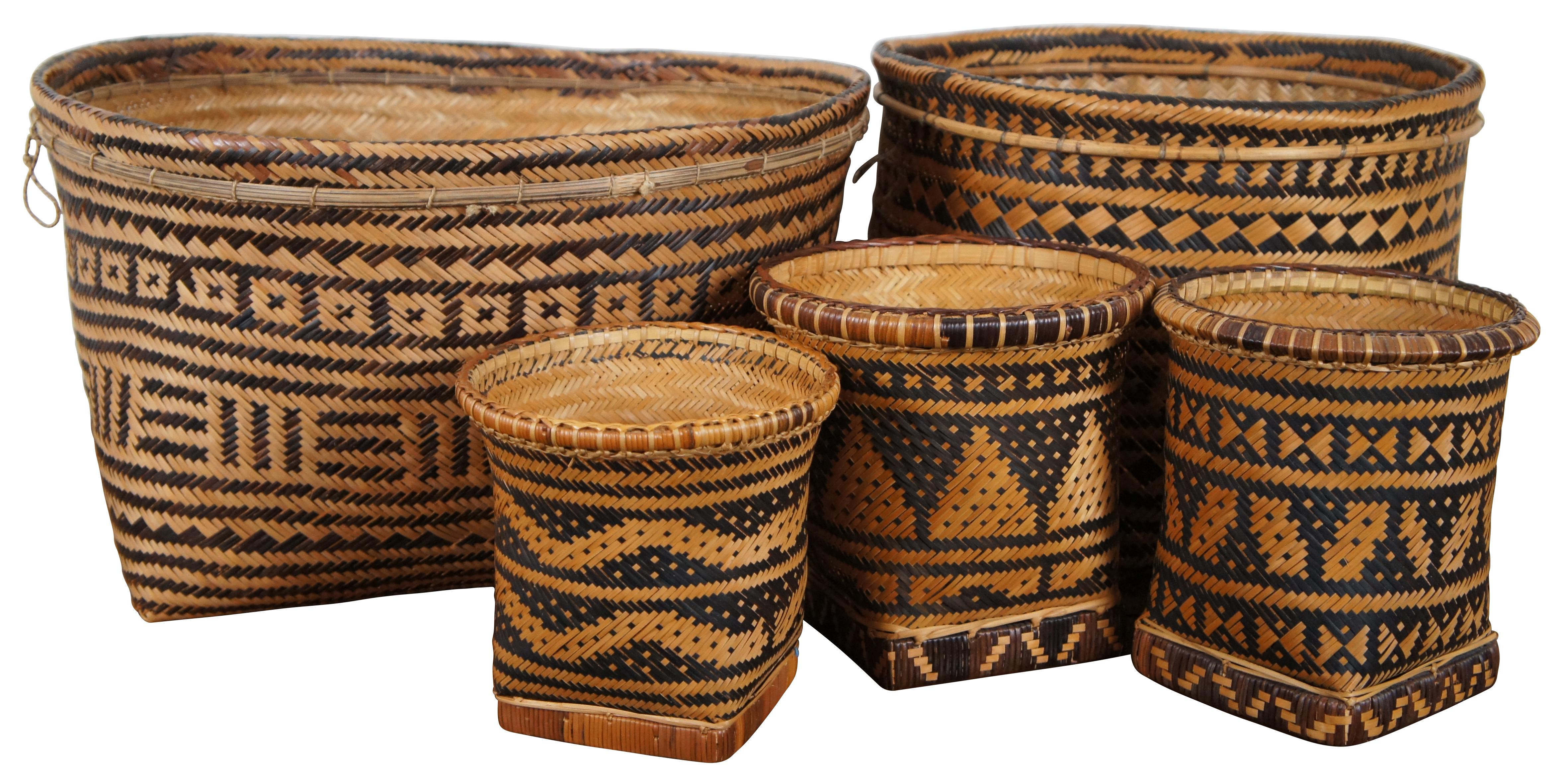 Set of five hand woven two tone, geometric, South American folk art baskets in a variety of sizes for a variety of potential uses from harvest / storage to cachepot / planter. One specifically marked Made in Brazil. 

Measures: 1 large - 17” x